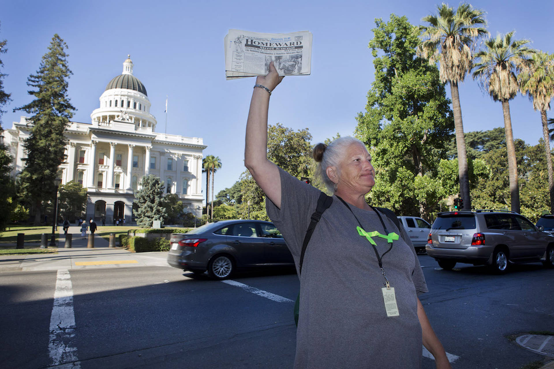 Debbie Bartley sells the Homeward newspaper near the state Capitol in Sacramento.  Steve Yeater/CALmatters