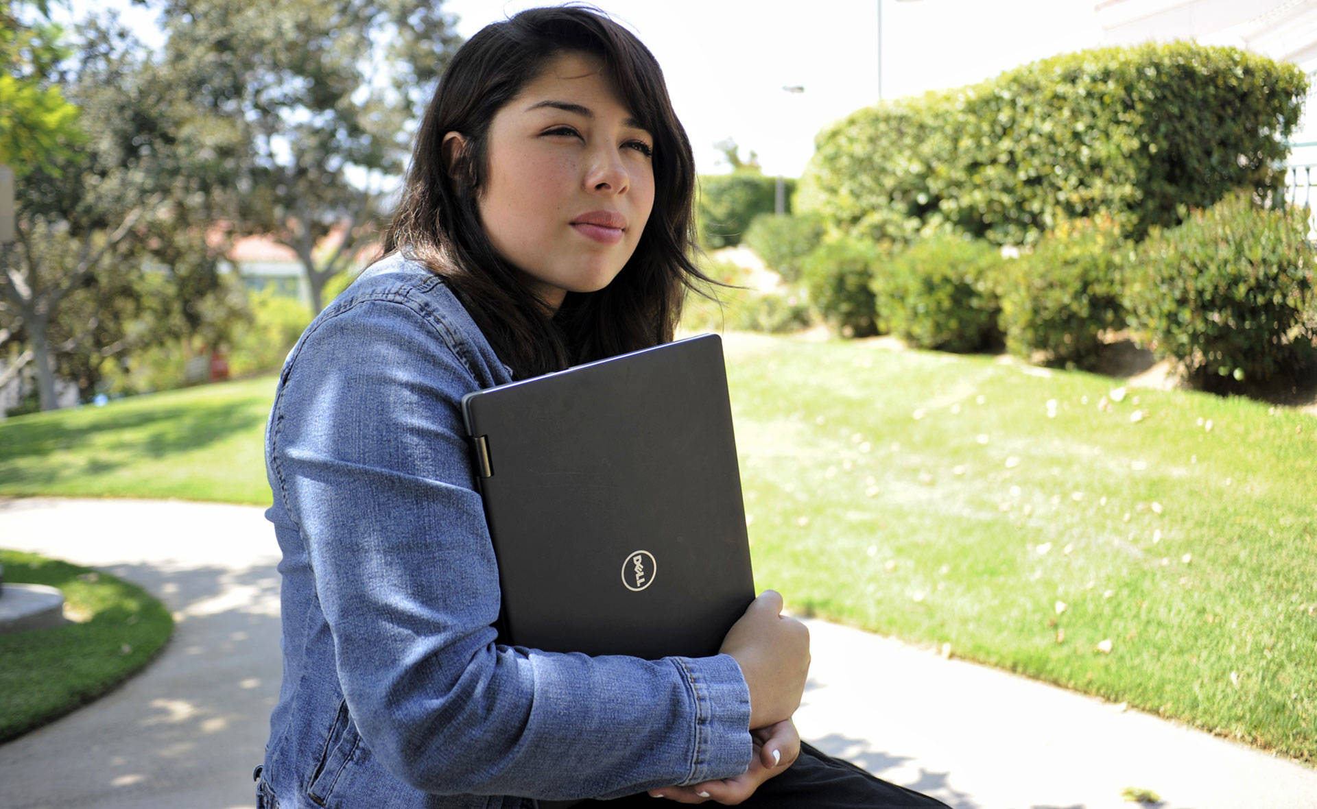 Dennisse Aldana, a student at Glendale Community College, received a refurbished laptop from iFoster. Blair Wells/KQED