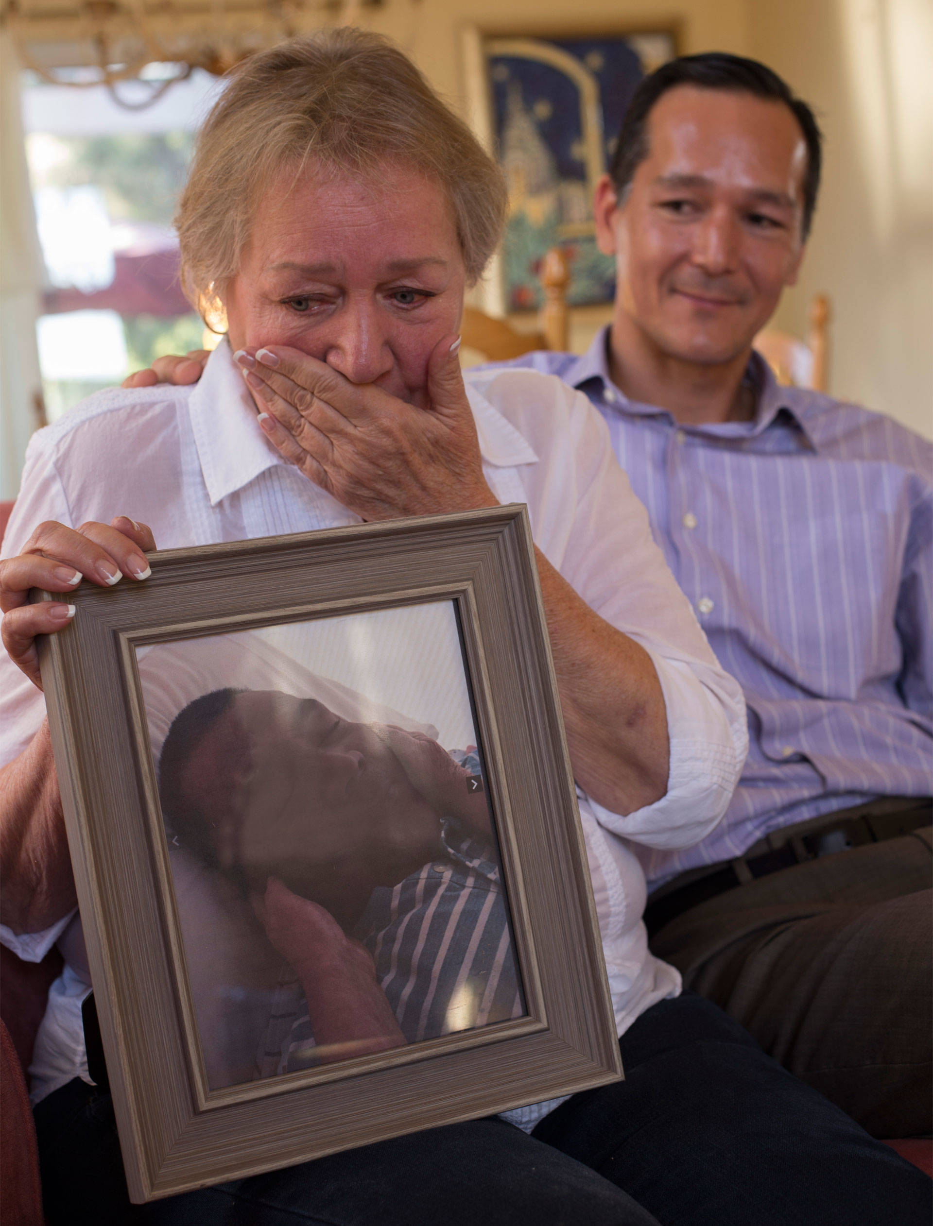 Rochelle Nishimoto  recounts the death of her son Jason with her other son Adrian. Lisa Pickoff-White/KQED