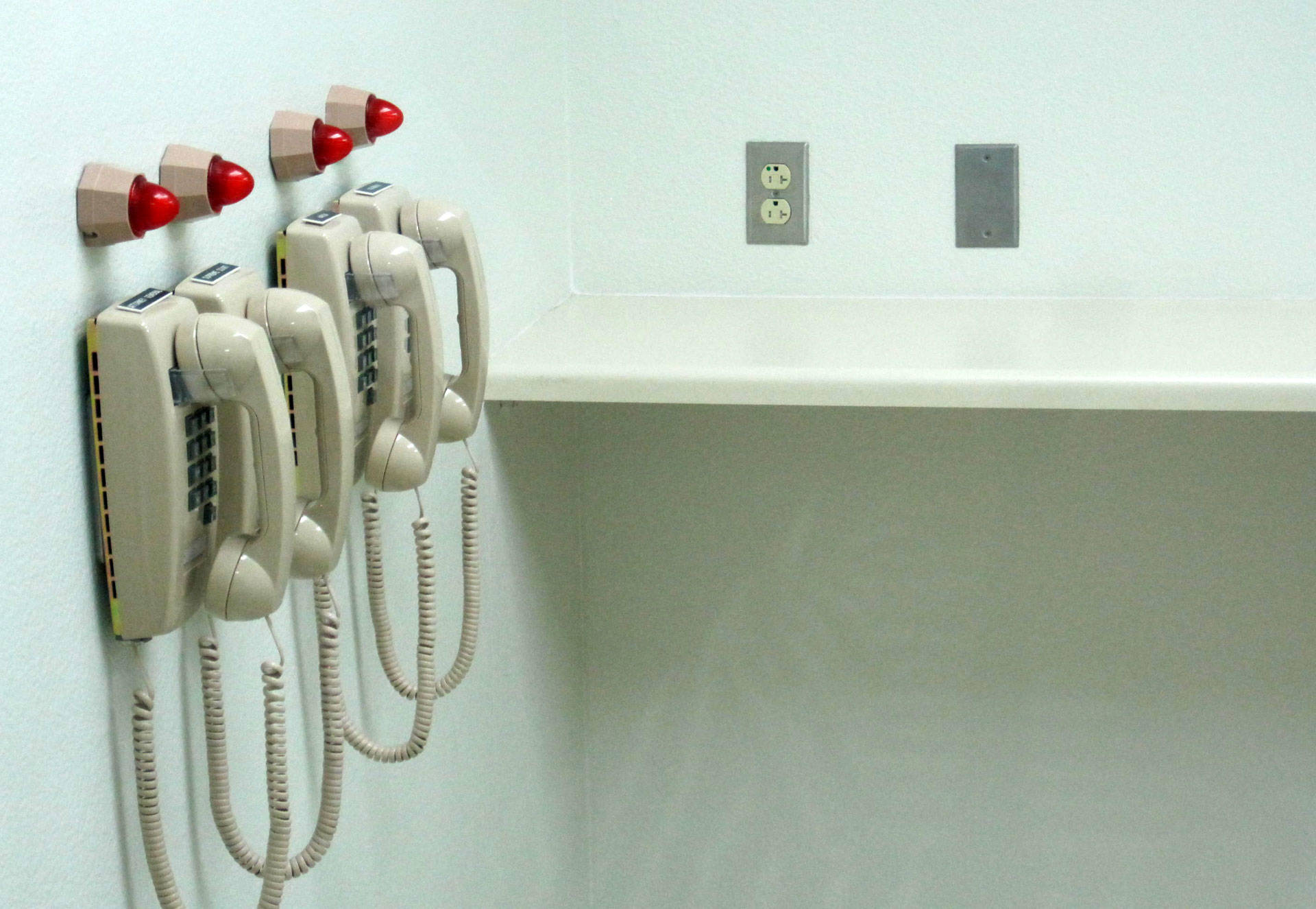 Phones line the wall of the lethal injection chamber at San Quentin State Prison when it was unveiled to reporters in 2010. The facility has never been used. Scott Shafer/KQED