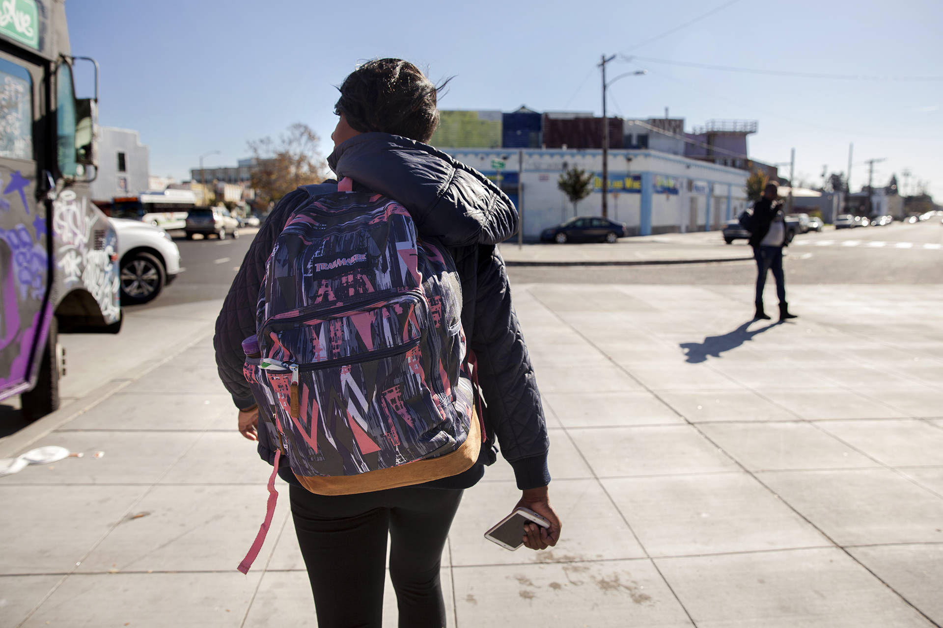 Brittany Jones, a student at Laney College, makes her way from class to her storage unit in West Oakland. Jones is currently homeless and spends up to three hours a day at her storage unit organizing her belongings, doing homework or relaxing. Brittany Hosea-Small/KQED