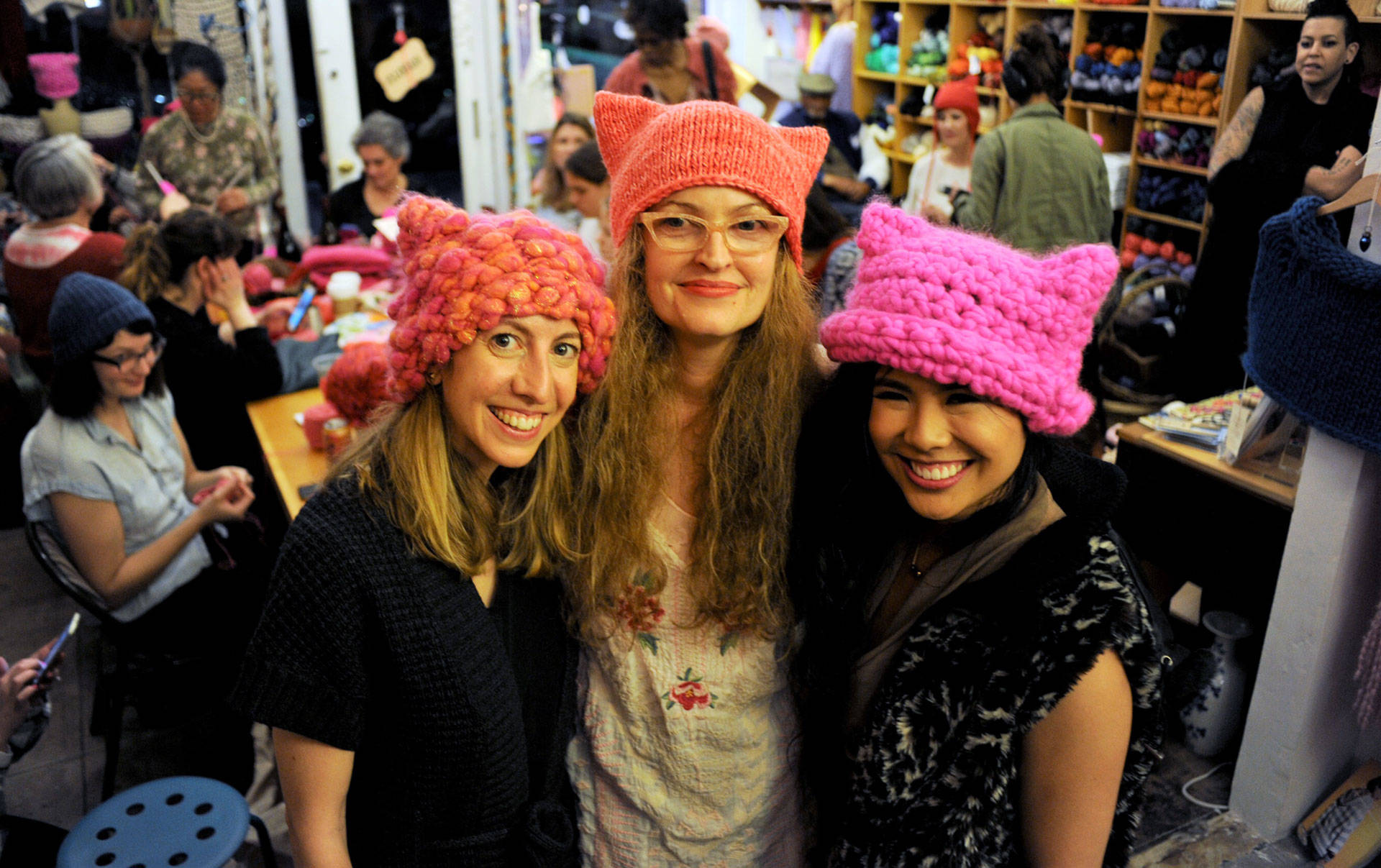 Pussyhat Project co-founder Jayna Zweiman (L), The Little Knittery owner Kat Coyle (C), and Pussyhat Project co-founder Krista Suh (R) at The Little Knittery in Los Angeles. Blair Wells/KQED
