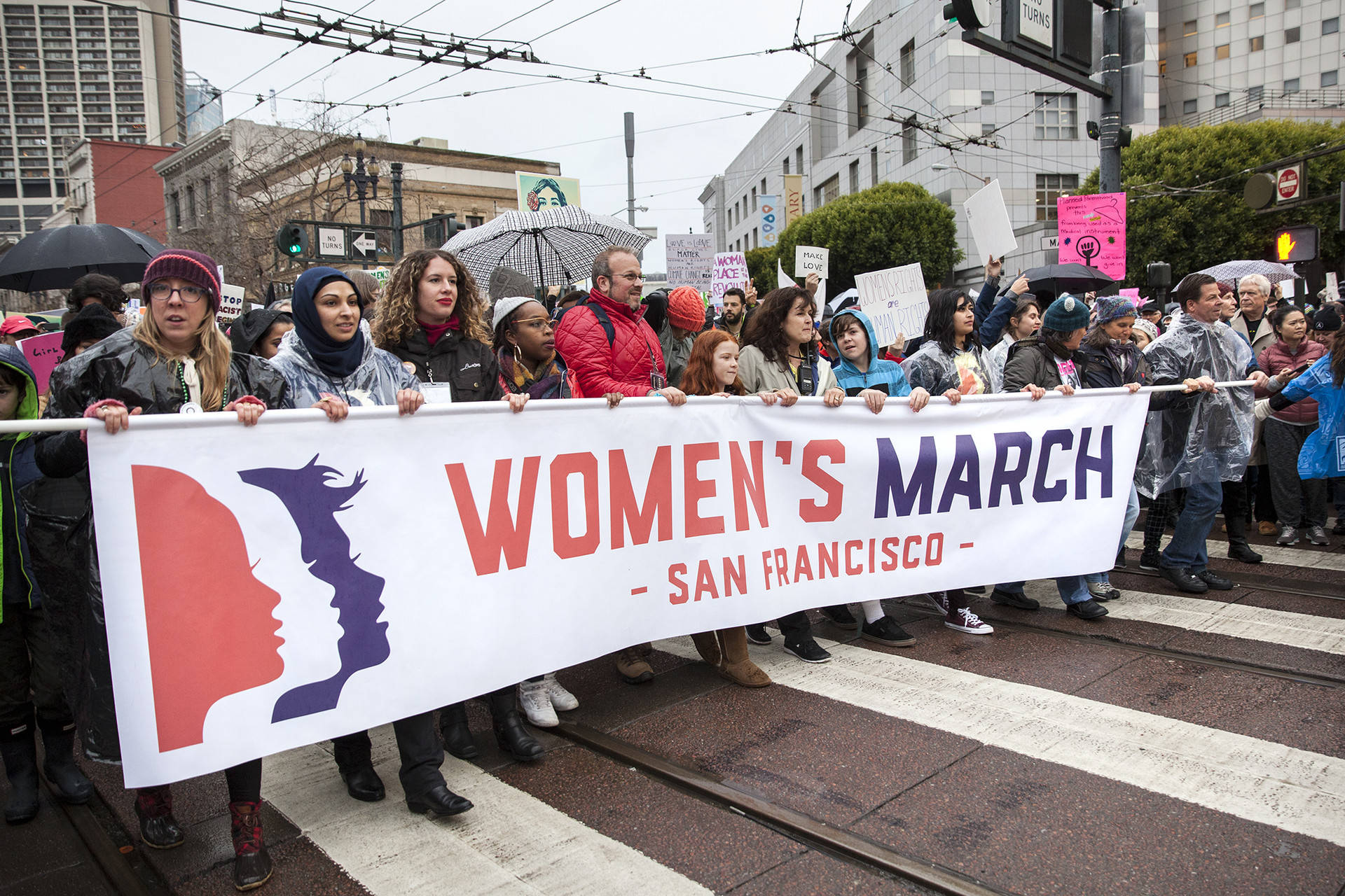 San Francisco’s Women’s March began at the Civic Center Plaza in San Francisco on Jan. 21, 2017. Even with looming clouds and rain thousands joined in the march down Market St. Brittany Hosea-Small/KQED