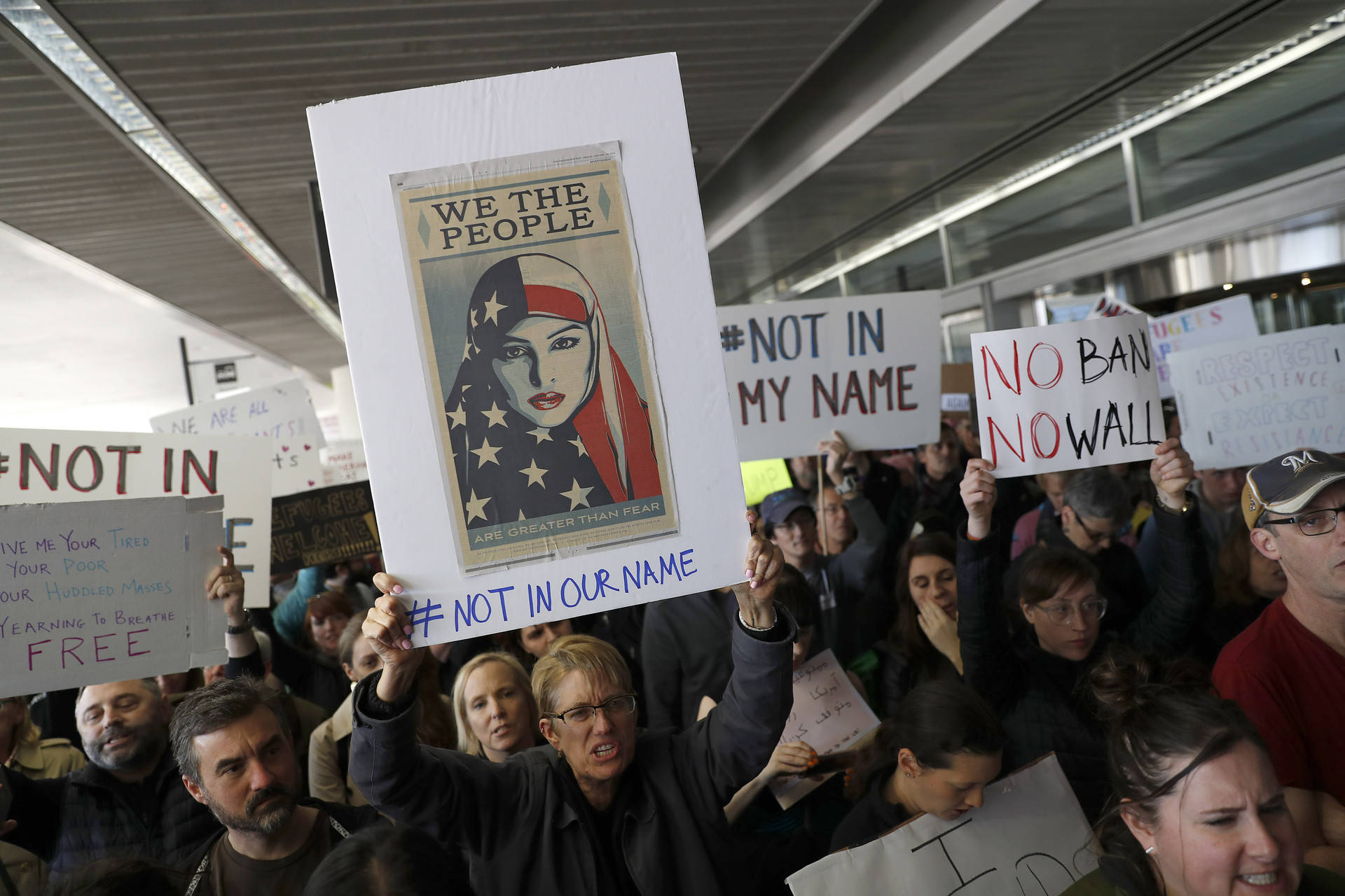 Demonstrators march at SFO to protest President Trump's new immigration policies.  Stephen Lam/Getty Images
