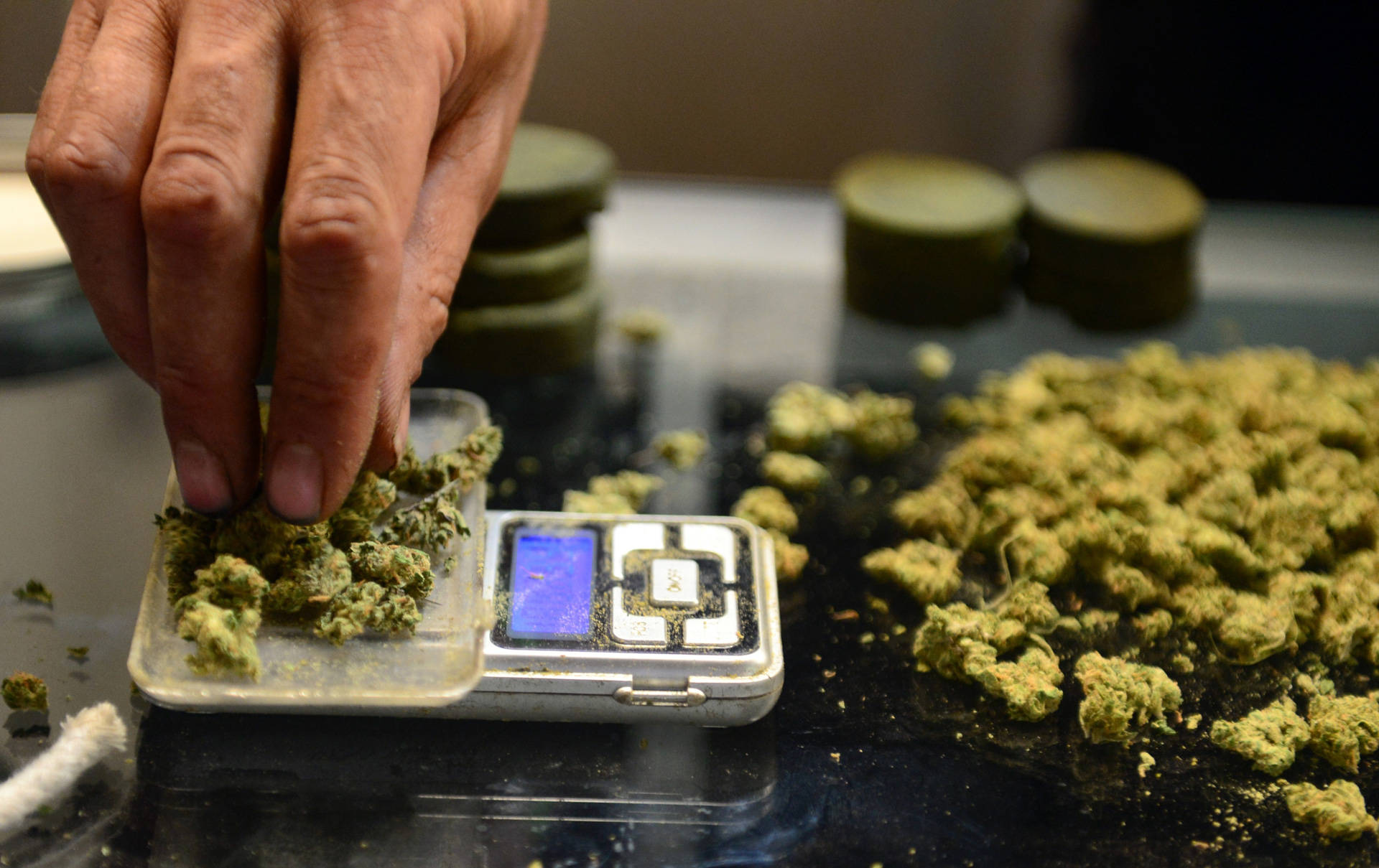 A vendor weighs marijuana buds in Los Angeles. The White House press secretary called recreational marijuana a 'very, very different subject' from medical marijuana. Frederic J. Brown/AFP/Getty Images
