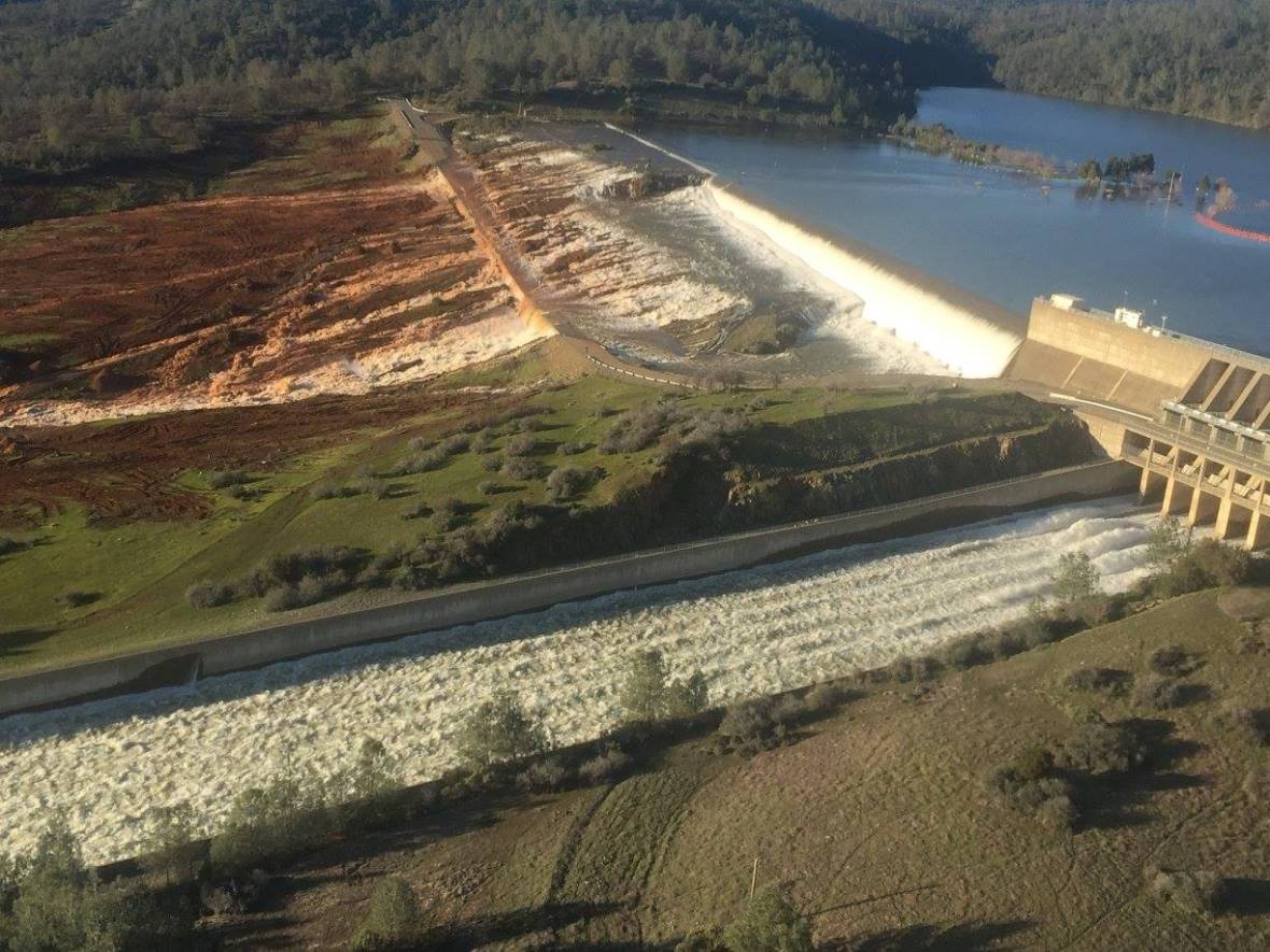 Main spillway and auxiliary spillway at Oroville Dam taken on Saturday, Feb. 11, 2017. about 3 p.m.  William Croyle/California Dept. of Water Resources