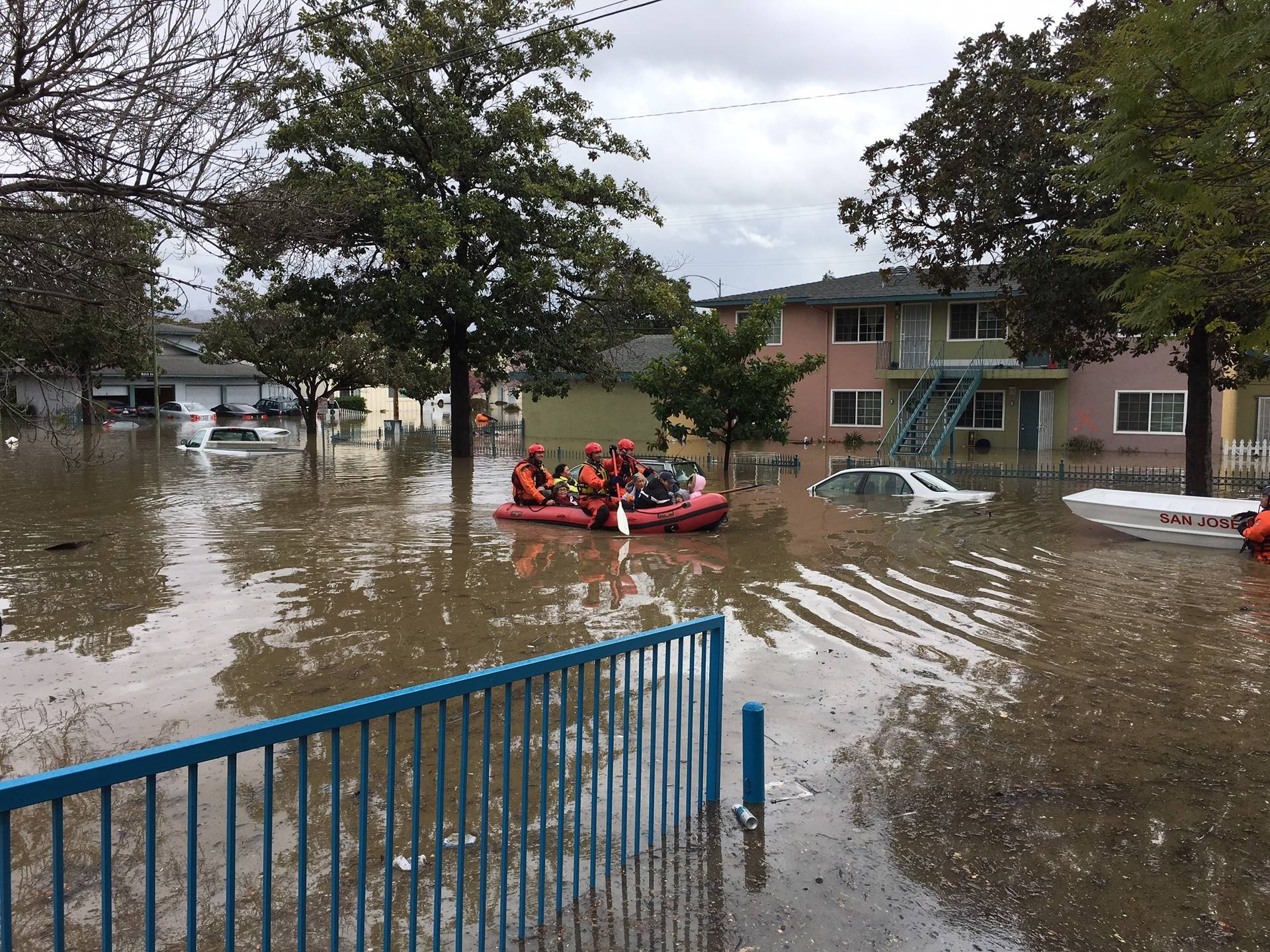 San Jose Fire Department plows through floodwaters on Feb. 21, 2017, looking for people to help after torrential rains triggered flooding. Peter Jon Shuler/KQED