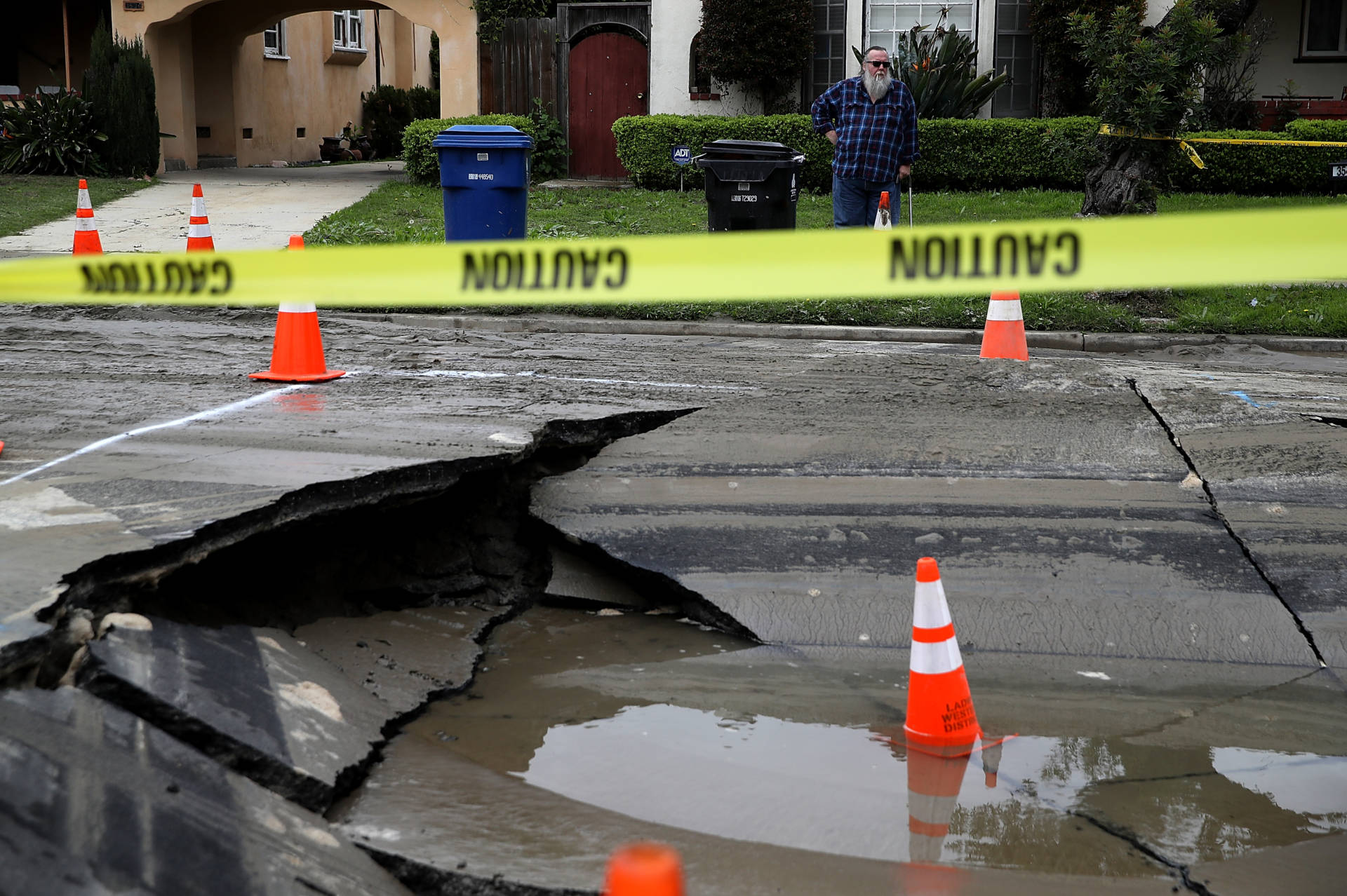 A massive sinkhole opened in L.A. in February after storms pounded the city.  Justin Sullivan/Getty Images