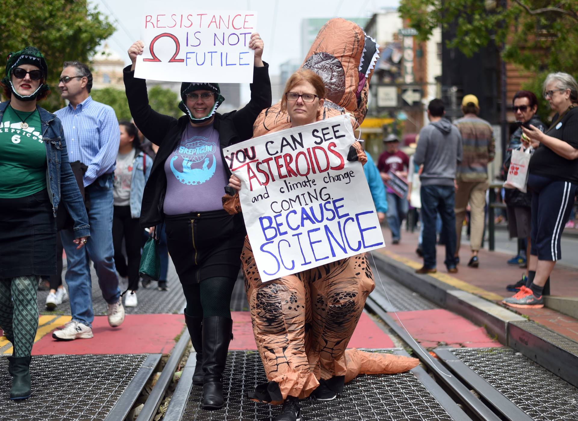 People hold up signs as thousands participate in the March for Science in San Francisco. Josh Edelson/AFP/Getty Images