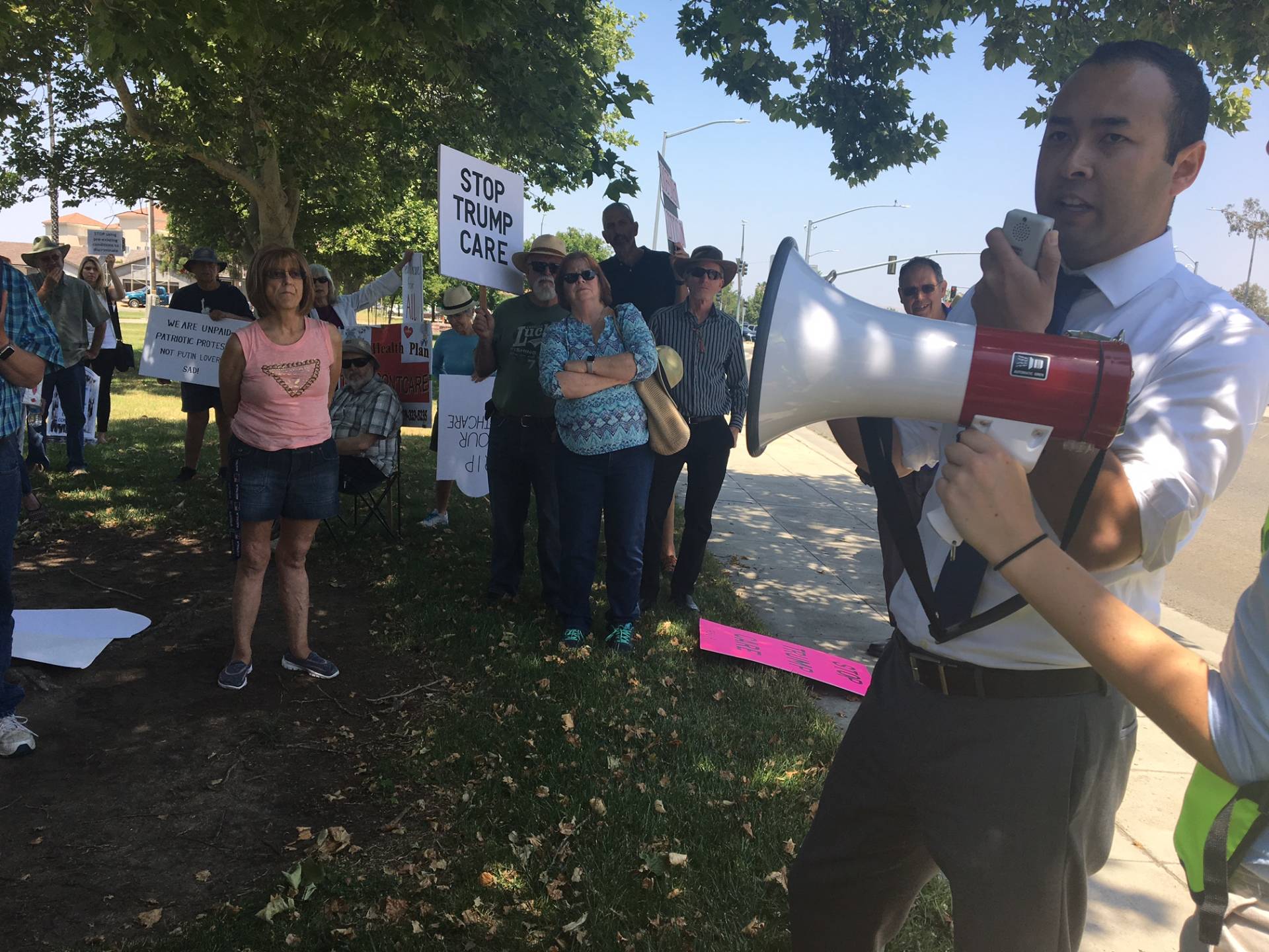 Andrew Janz speaks to a crowd near Devin Nunes' office in Clovis.  Vanessa Rancano/KQED