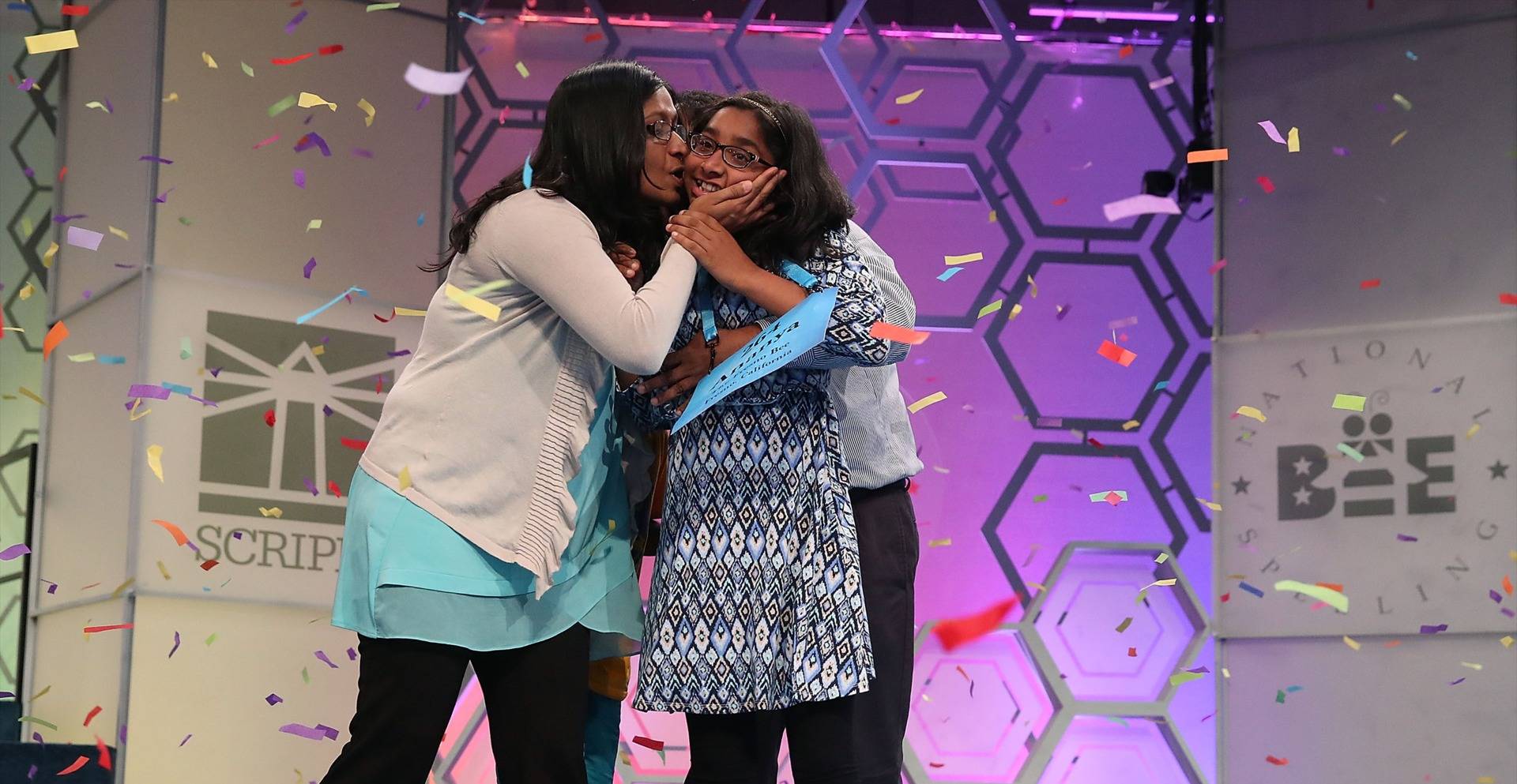 Ananya Vinay, 12, of Fresno, California, gets a kiss from her mom, Anu Pama Poliyedathpp, after winning the 2017 Scripps National Spelling Bee on June 1, 2017, in Oxon Hill, Maryland.  Mark Wilson/Getty Images