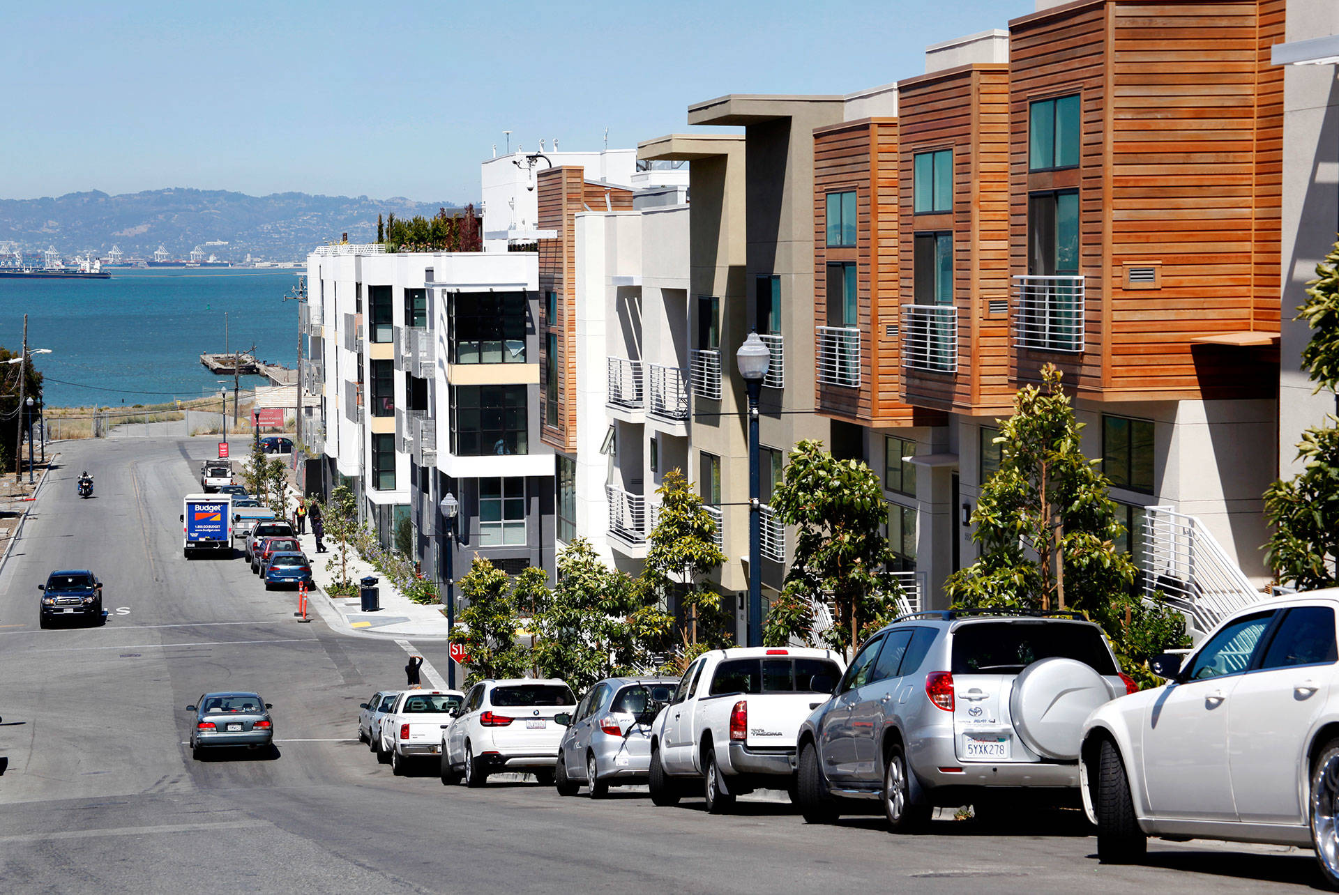 Several finished apartment buildings in Lennar's San Francisco Shipyard development look out over the bay in Hunters Point. Brittany Hosea-Small/KQED