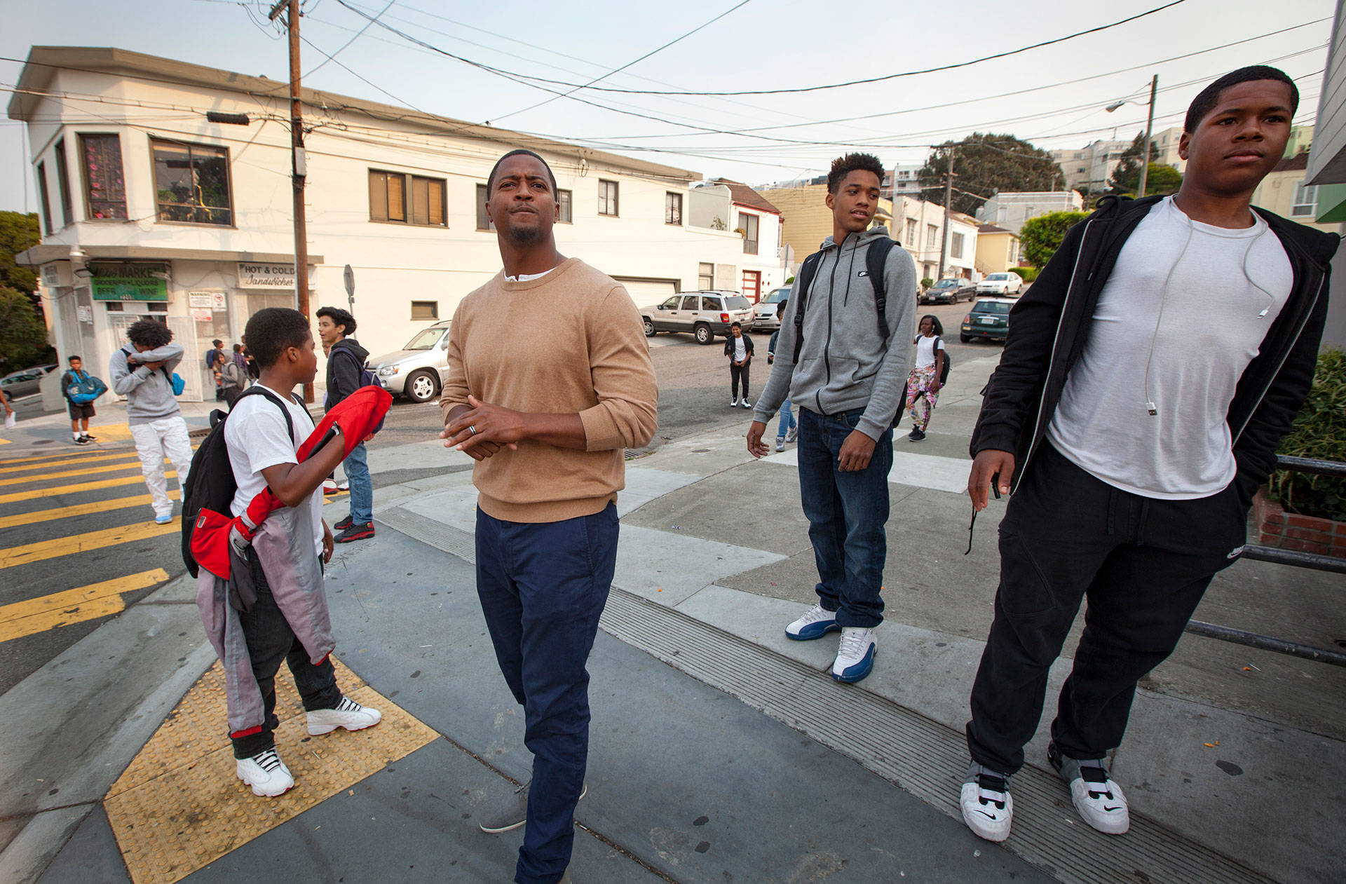 Principal Charleston Brown oversees dismissal at Willie L. Brown Jr. Middle School in San Francisco’s Bayview neighborhood. His black students struggle to pass state tests in reading and math. Penni Gladstone/CALmatters