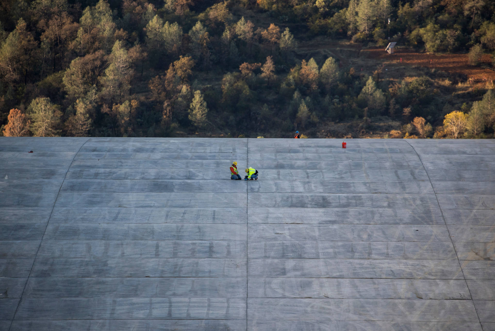 Workers last week continued finishing work on the upper chute of Oroville Dam's main spillway. Ken James/California Department of Water Resources