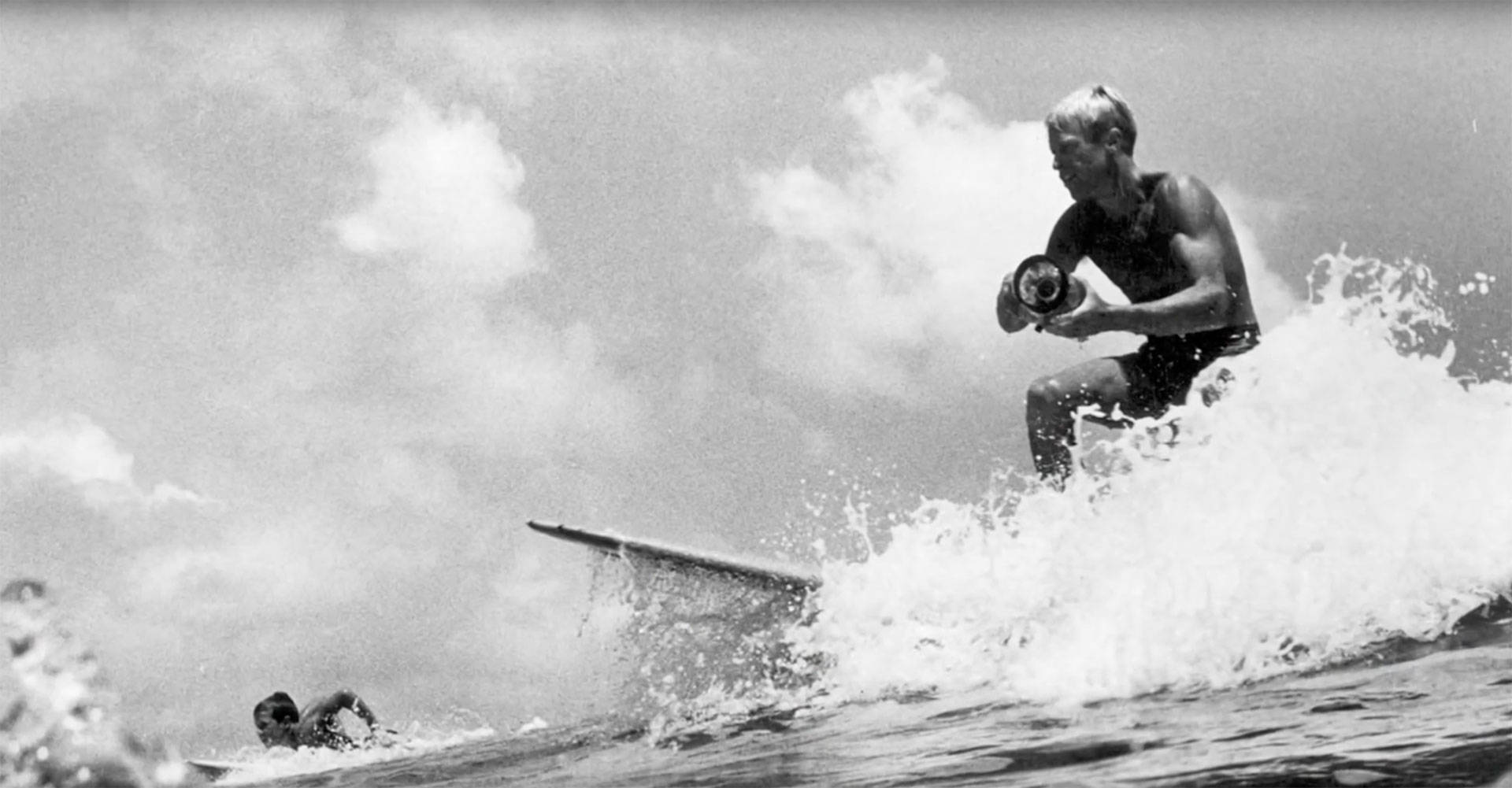 Bruce Brown, surfing with a camera. Red Bull/YouTube
