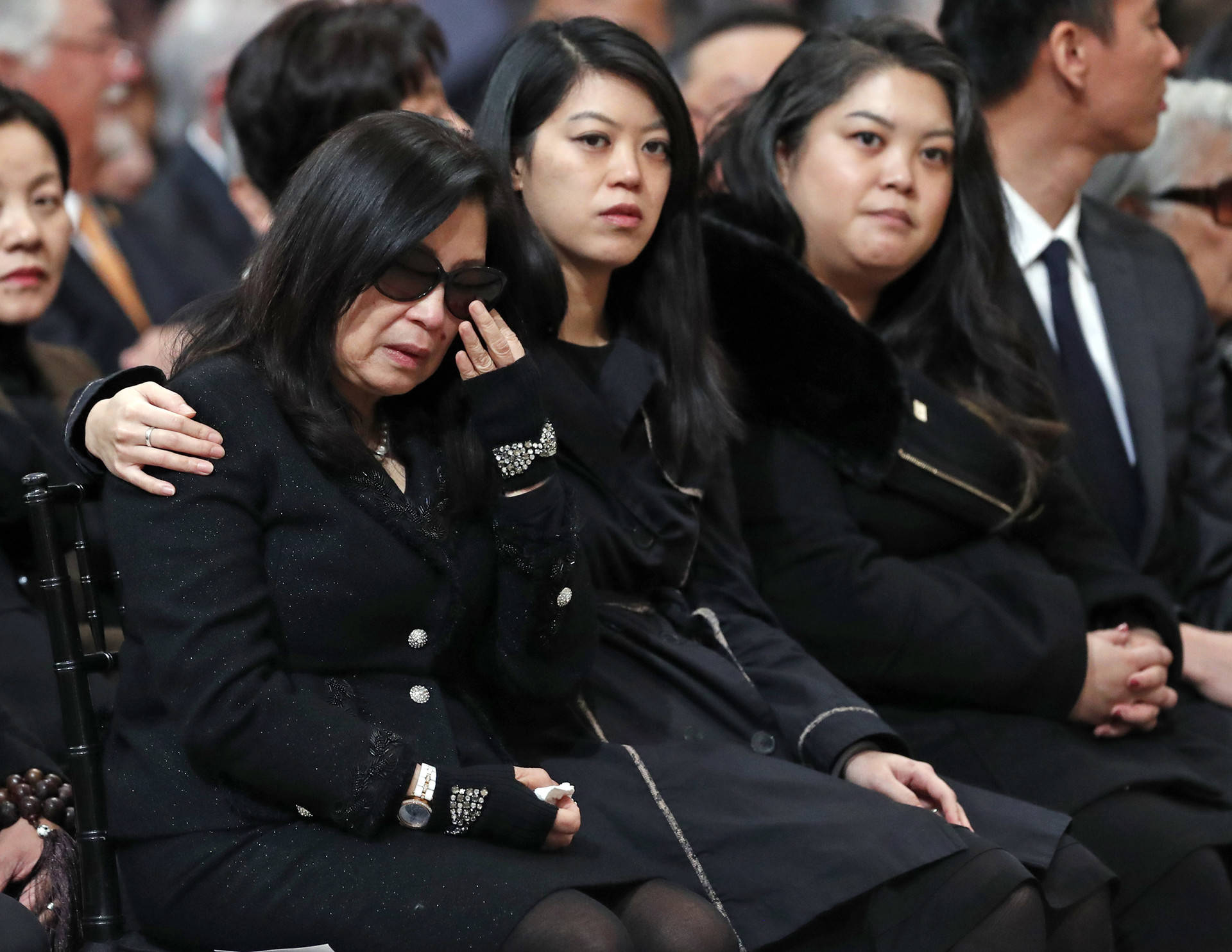 Anita Lee and her daughters, Brianna and Tania, during a service Celebrating the Life of Mayor Edwin M. Lee at San Francisco City Hall on Sunday, Dec. 17, 2017. Scott Strazzante/San Francisco Chronicle via AP, Pool