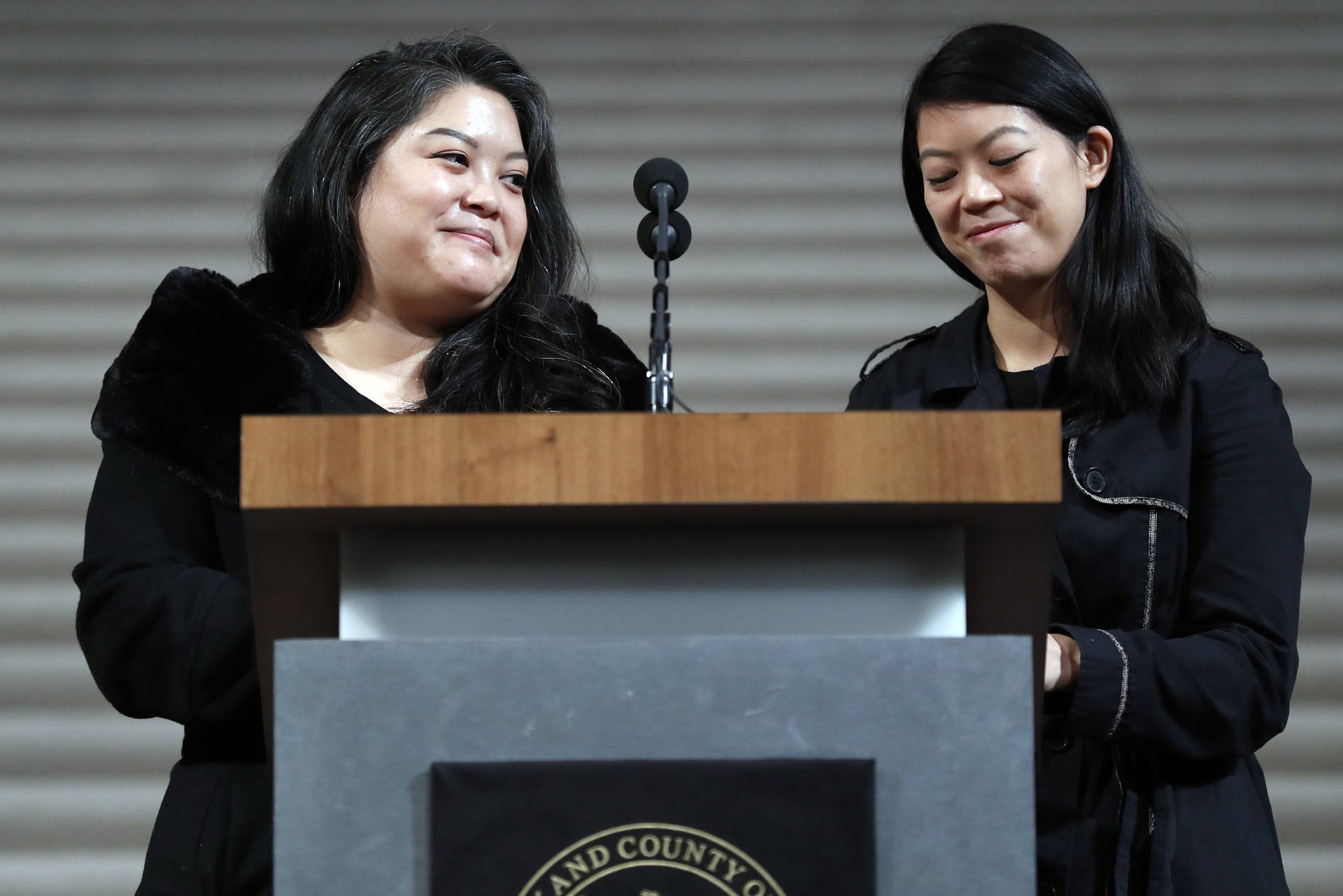 Ed Lee's daughters, Tania and Brianna Lee, speak during a service celebrating the life of Mayor Edwin M. Lee at San Francisco City Hall on Sunday, Dec. 17, 2017. Scott Strazzante/San Francisco Chronicle via AP, Pool