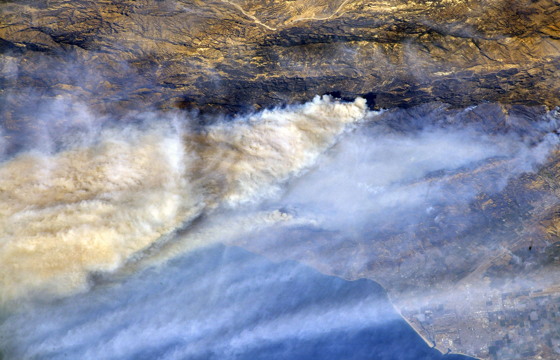 Plumes of smoke from various Southern California fires -- the largest from the massive Thomas Fire -- blow out to sea in an photo taken from the International Space Station on Dec. 8, 2017. Randy Bresnik/NASA
