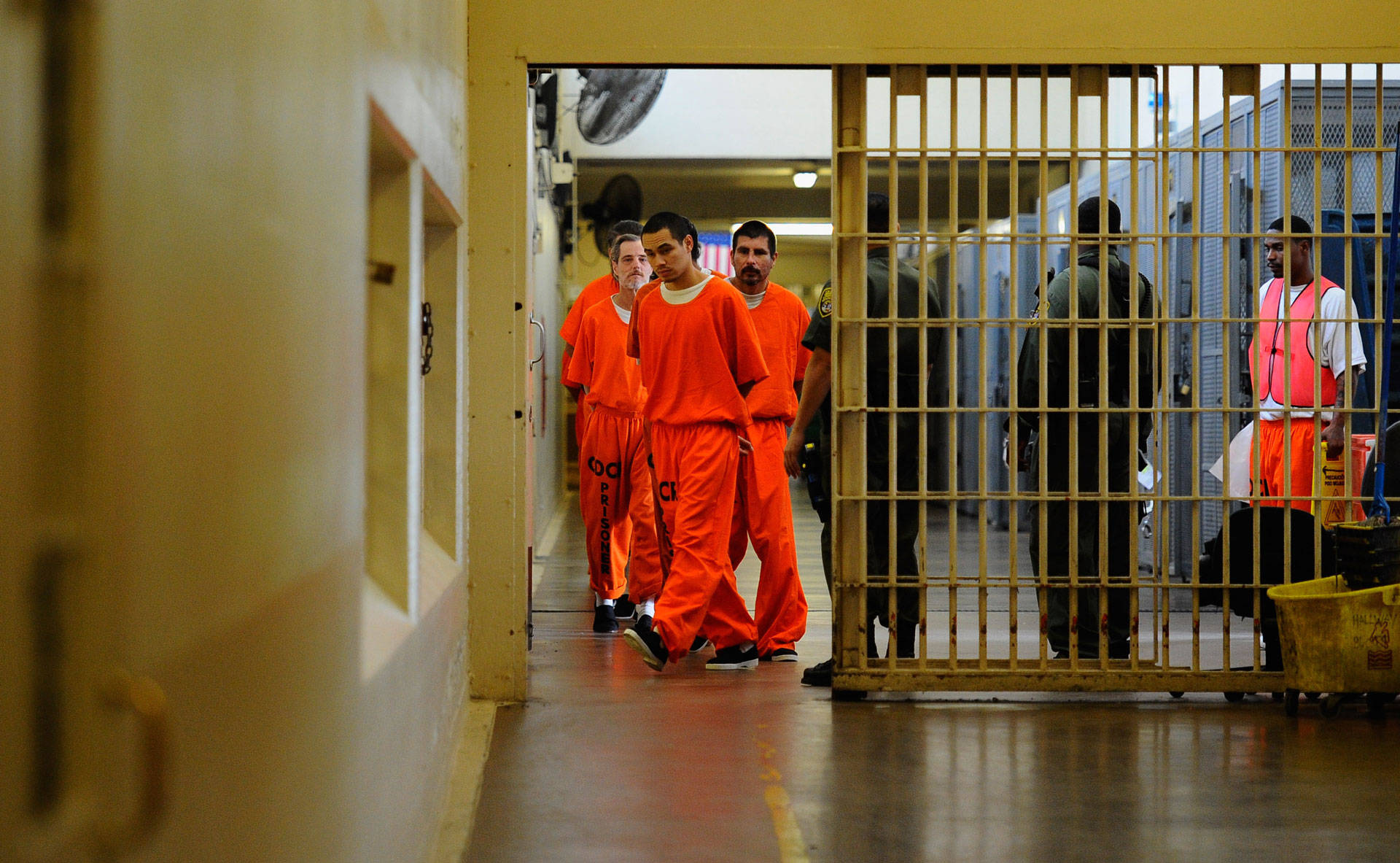 Inmates at Chino State Prison walk the hallway in 2010. Kevork Djansezian/Getty Images