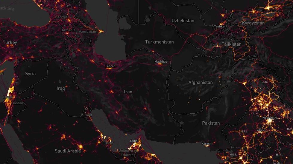 Zooming in on countries with few native Strava users is one way to track likely NATO forces, experts say. Known bases in Afghanistan and Syria appeared with bright lines amid dark backgrounds in the exercise tracking firm's map. Strava Heat Map; Screenshot by NPR