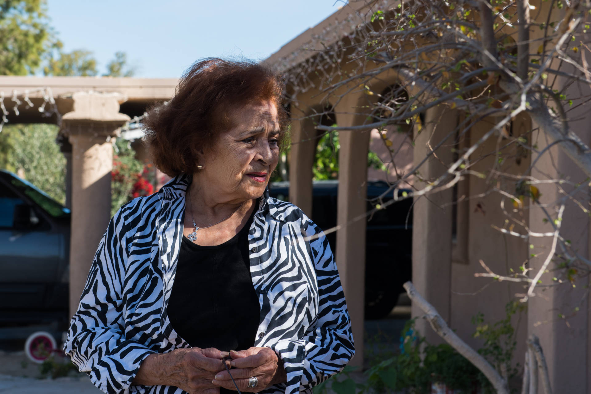 Ramona Morales, 79, had to pay about $6,000 in legal bills on top of a fine because one of her tenants kept chickens in the backyard of a rental house. Some Southern California cities are prosecuting code violators and slapping homeowners with gigantic legal bills they can't afford to pay. Jessica Chou for NPR