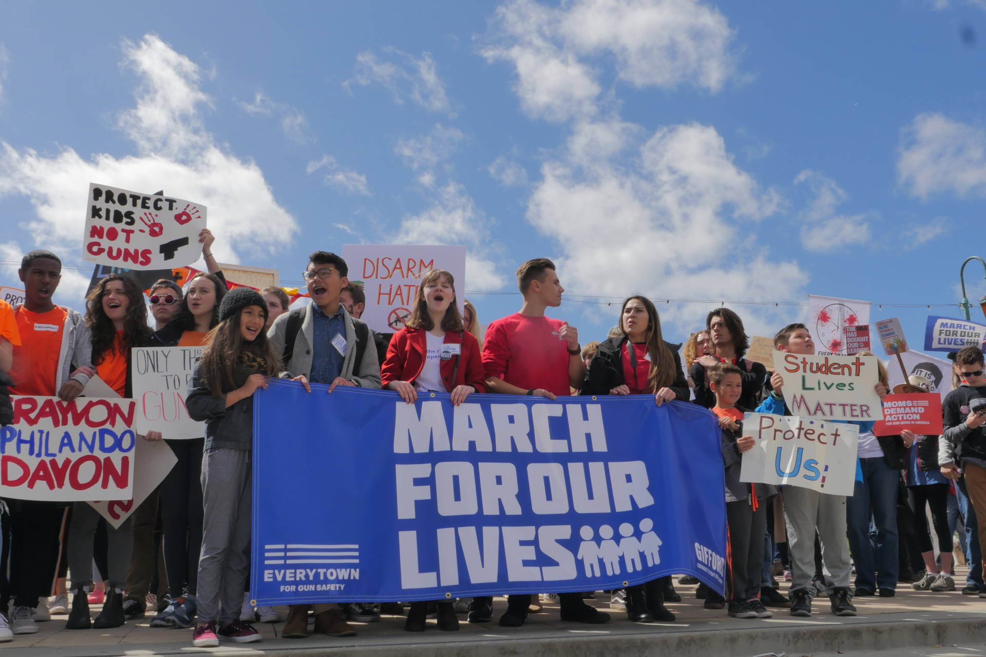 Student organizers march at Lake Merritt as similar marches were happening around the world.  Sheraz Sadiq/KQED