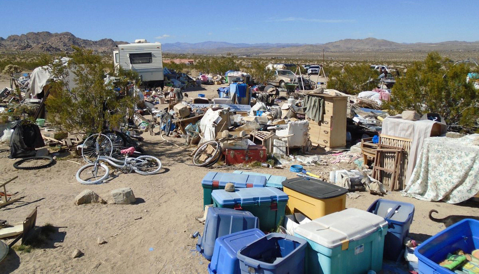 This handout photograph obtained March 1, 2018 courtesy of the San Bernardino County Sheriff's Department, Morongo Basin Station, shows the area in Joshua Tree where a couple were allegedly living with their three children inside a box for four years. STR/AFP/Getty Images