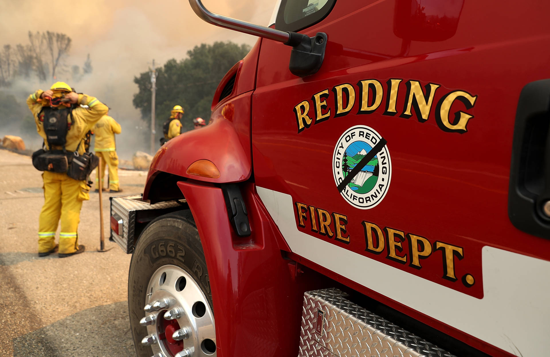 A black band is placed over the logo on a Redding Fire Department truck in honor of Jeremy Stoke, a fire prevention inspector with the agency who died July 26. Justin Sullivan/Getty Images