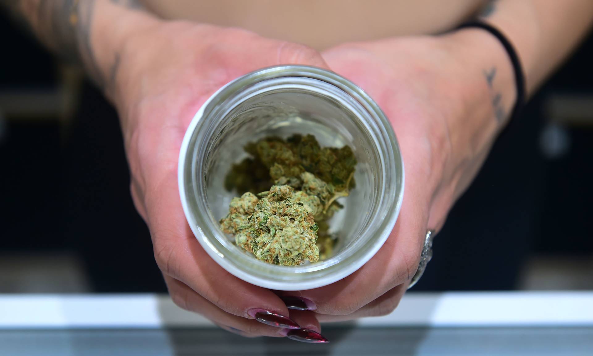 A jar of Insane OG, a strain of marijuana, is displayed at the opening of 'Dr. Greenthumb', the flagship medical and recreational marijuana dispensary opened today by B Real of Cypress Hill fame in Sylmar, California on August 15, 2018. FREDERIC J. BROWN/AFP/Getty Images