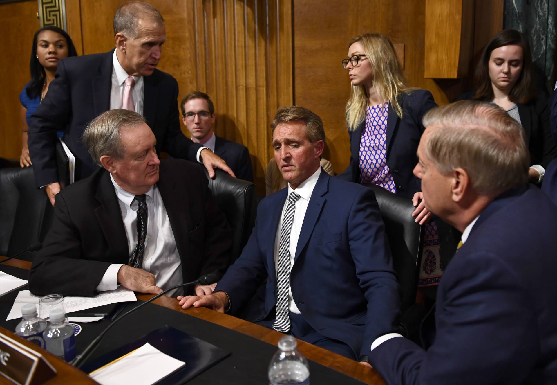 Senate Judiciary Committee member Sen. Jeff Flake (R-AZ) speaks with committee colleagues during a hearing on Capitol Hill in Washington, DC on Sept. 28, 2018 on the nomination of Brett M. Kavanaugh to be an associate justice of the Supreme Court of the United States. Brendan Smialowski/AFP/Getty Images