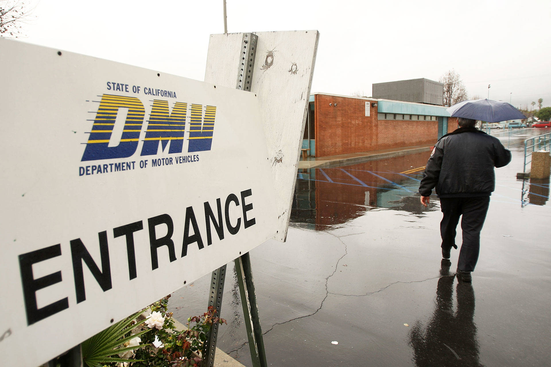 A security guard outside a California DMV office in Pasadena. David McNew/Getty Images