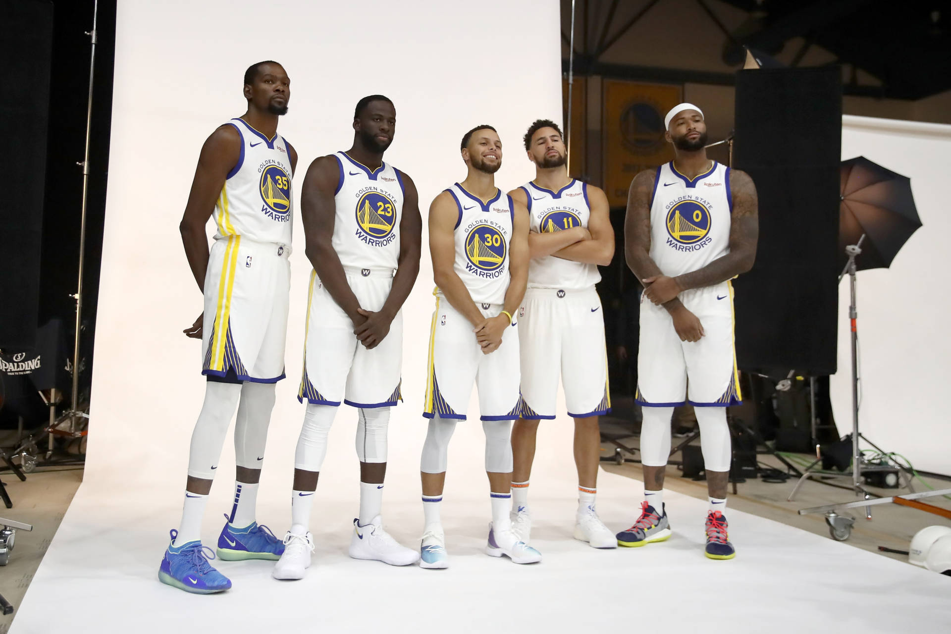 (From left) Kevin Durant, Draymond Green, Stephen Curry, Klay Thompson and DeMarcus Cousins pose at the Warrirors media day in September.  Ezra Shaw/Getty Images