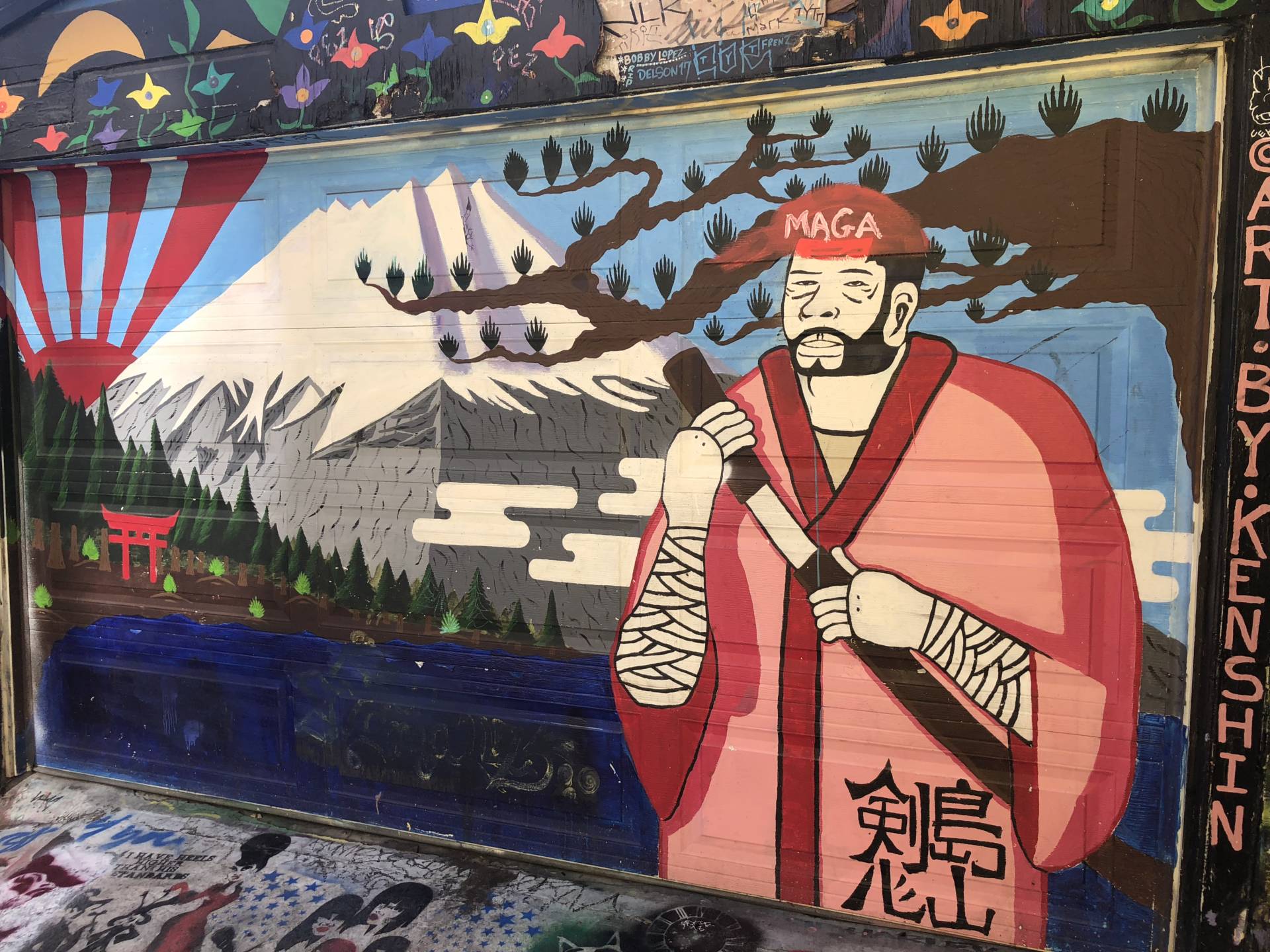 Several murals were vandalized with "Make America Great Again" imagery. Tiffany Camhi/KQED