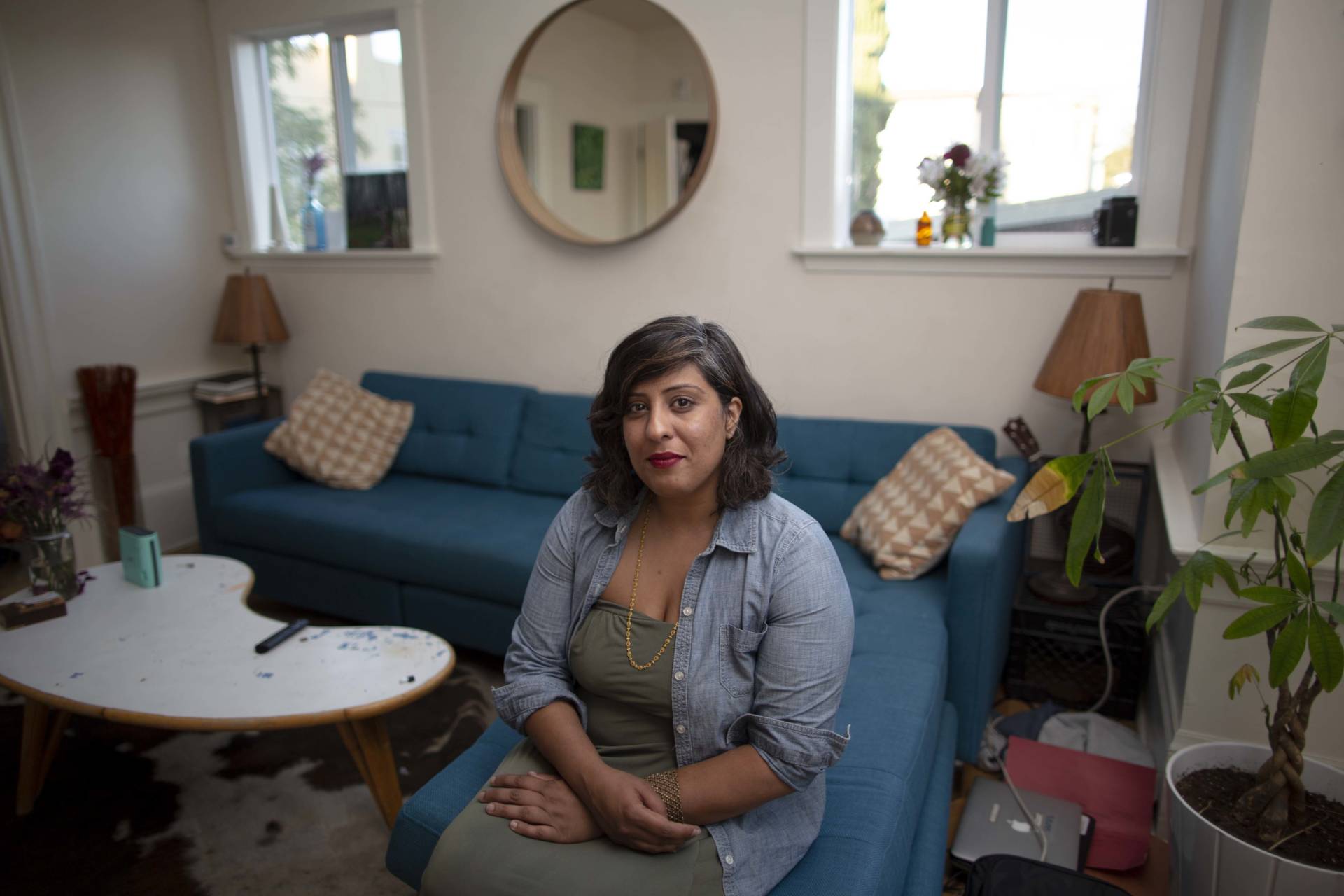 Jas Johl in the living room of her home in North Oakland. Johl pays about $13,000 a year in property taxes, far more than many of her neighbors. Sean Havey for California Dream
