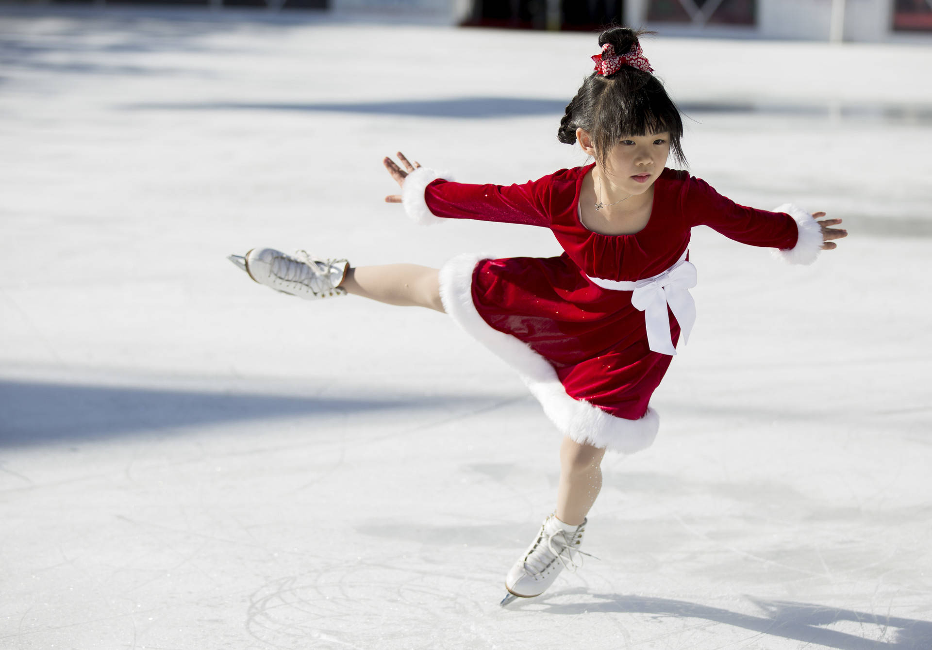 Chloe Lee, 6, performs a solo routine to the song 'Welcome Christmas' from 'How the Grinch Stole Christmas.' Anne Wernikoff/KQED