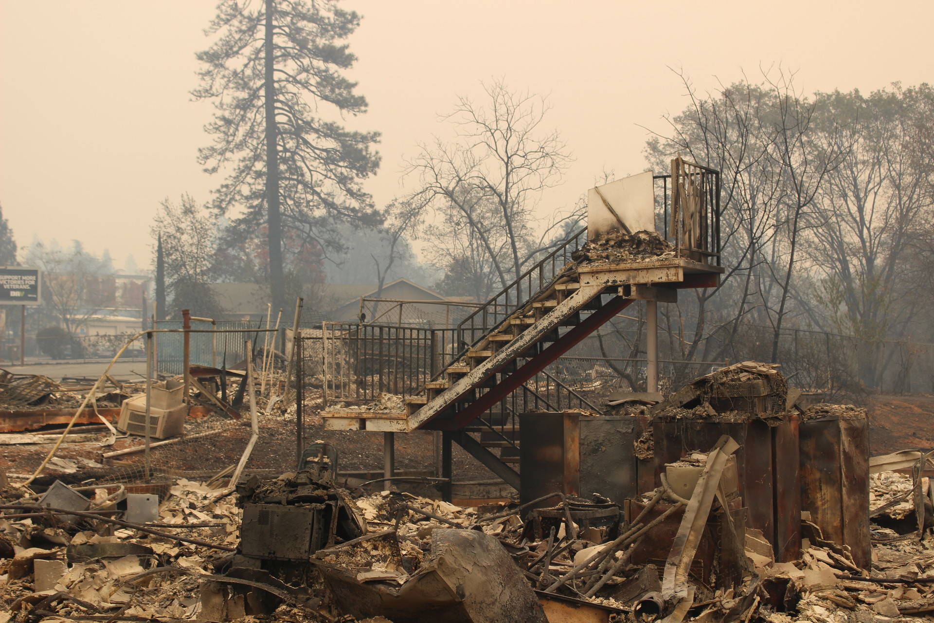 The debris left behind by the Camp Fire in Butte County will take a year to clean up.  Danielle Venton/KQED