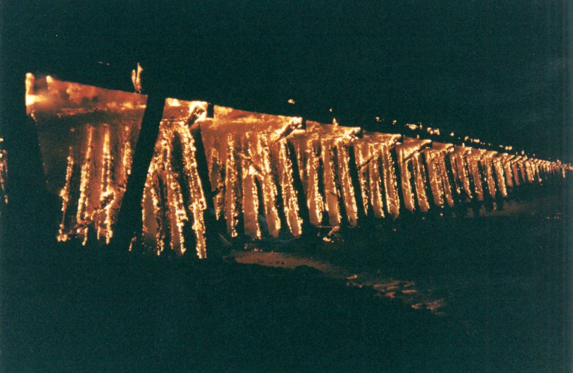 The Dumbarton Rail Bridge trestle on fire on Jan. 3, 1998. Ben Cheng/Menlo Park Fire District