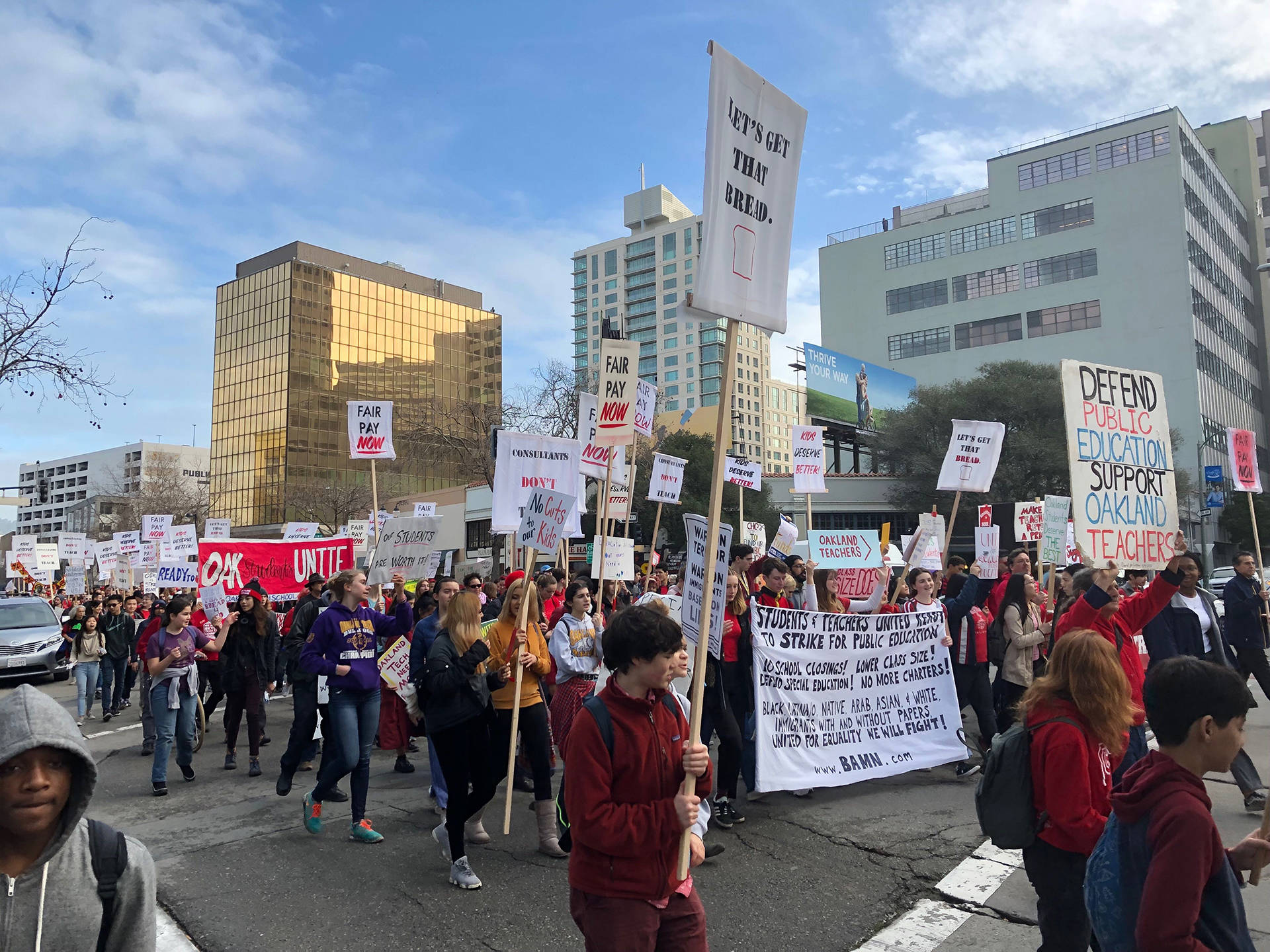 Hundreds of Oakland teachers, students and supporters, frustrated over an impasse in contract negotiations with the school district, gathered outside Oakland Technical High School and then marched in a walkout on Jan. 18, 2019. Ryan Levi/KQED