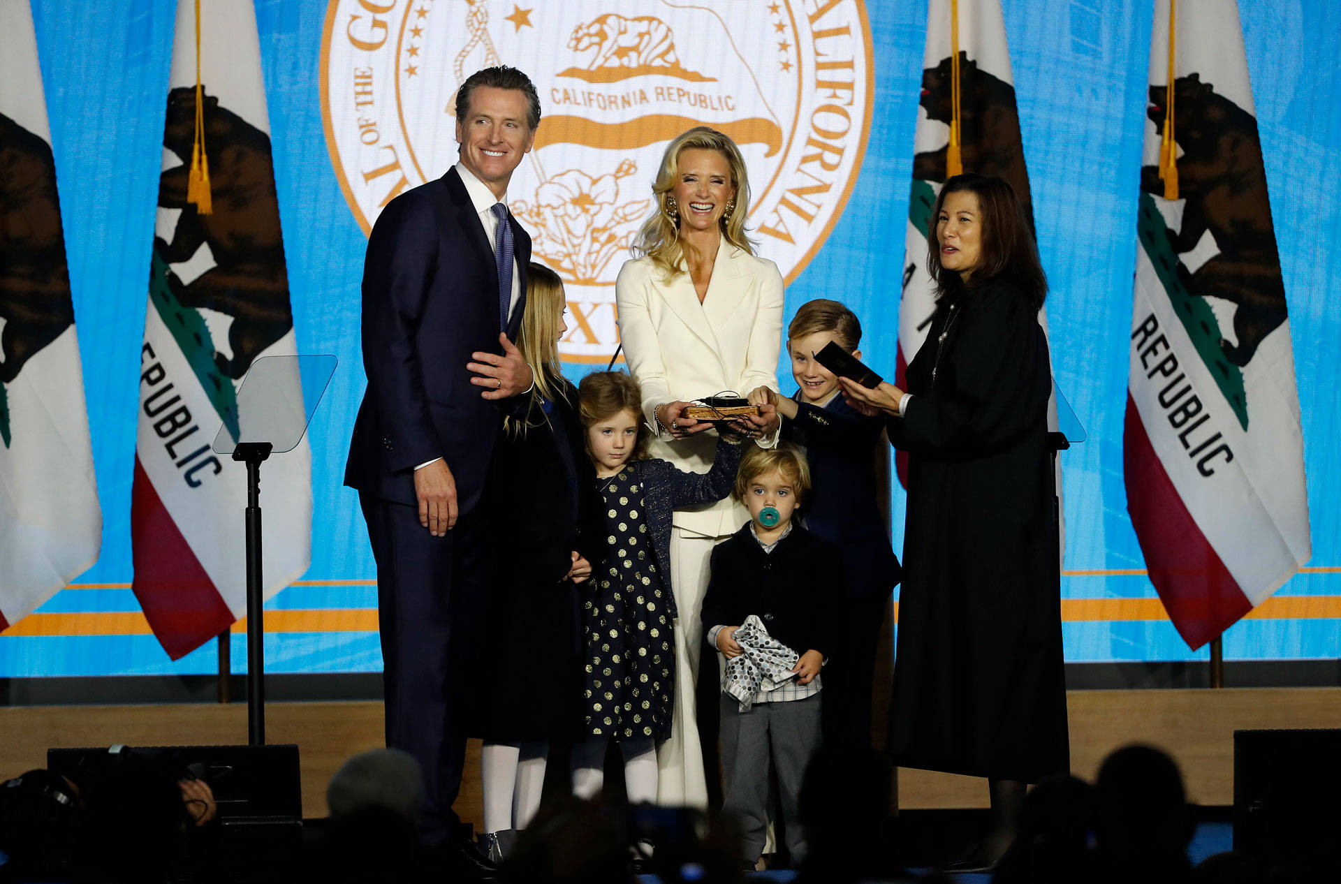 Gavin Newsom is sworn in as governor of California by California Chief Justice Tani Cantil-Sakauye (R), as Newsom's wife, Jennifer Siebel Newsom (C), watches on Jan. 7, 2019, in Sacramento. Stephen Lam/Getty Images