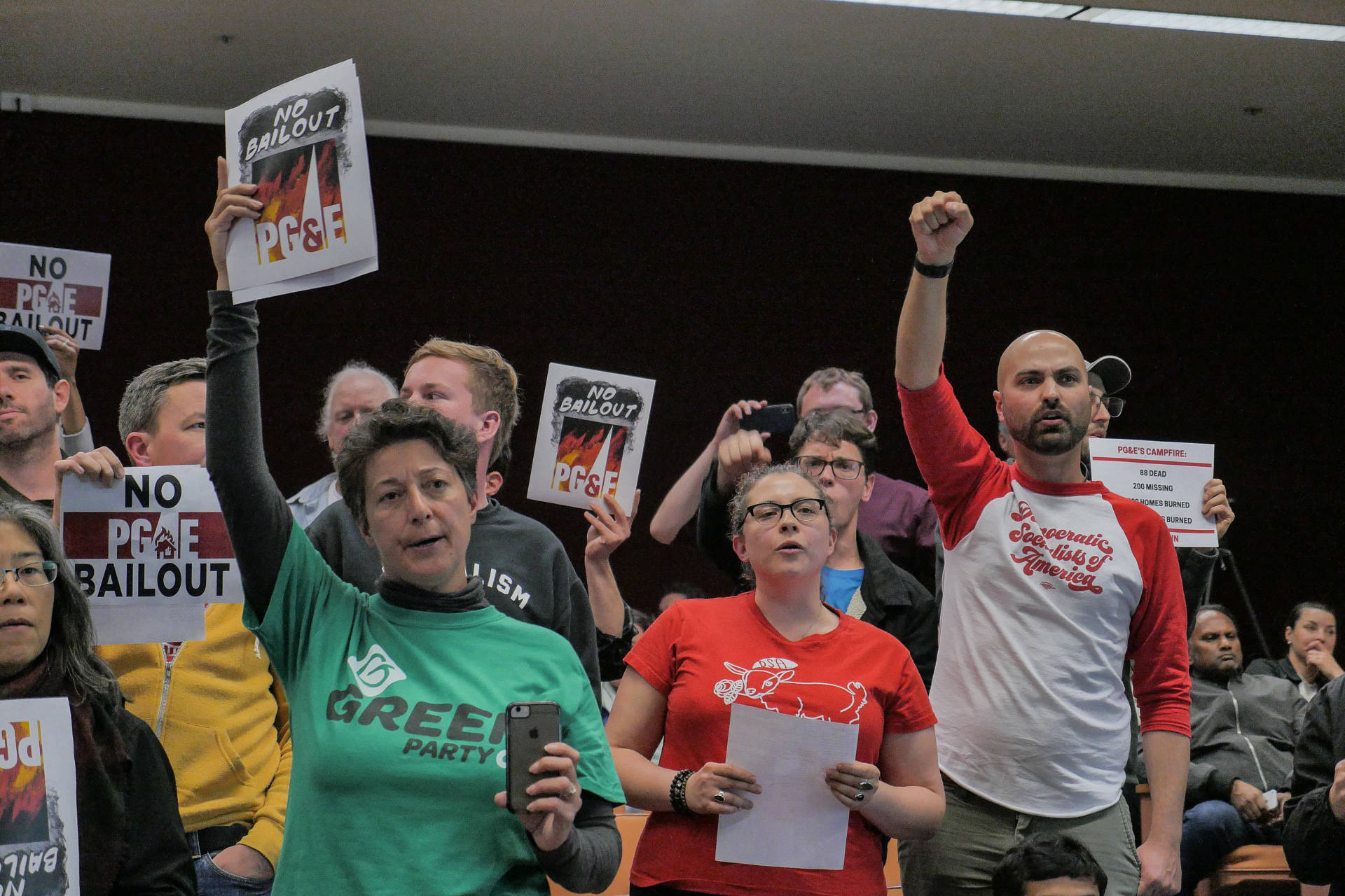 Activists from the No PG&amp;E Bailout coalition protest at the end of an emergency CPUC meeting on Jan. 28, 2019. Sheraz Sadiq/KQED