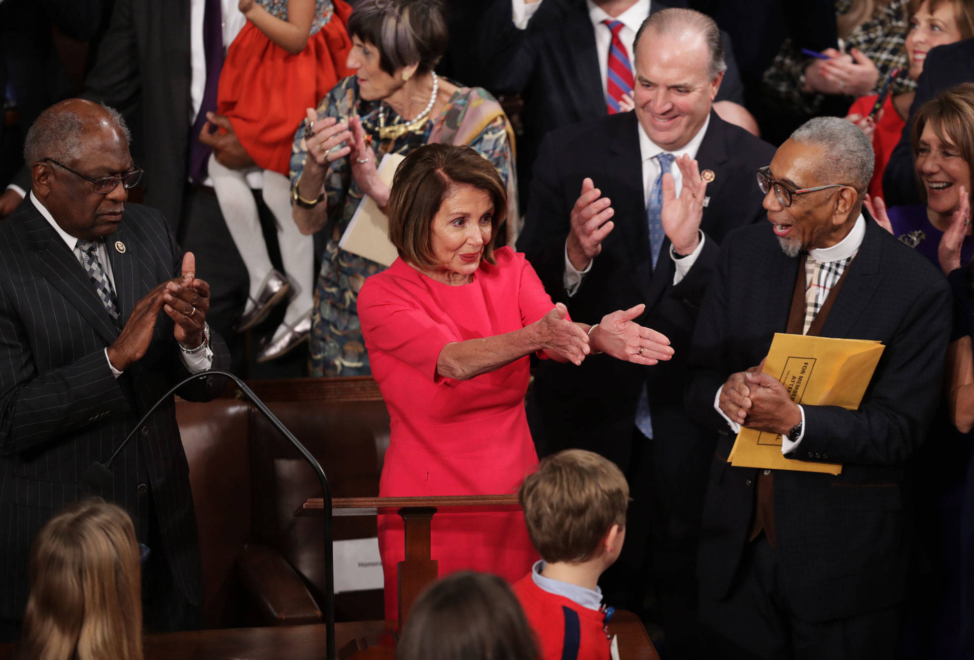 Members of Congress congratulate newly elected Speaker of the House Nancy Pelosi during the first session of the 116th Congress at the U.S. Capitol Jan. 3, 2019 in Washington, D.C. Chip Somodevilla/Getty Images