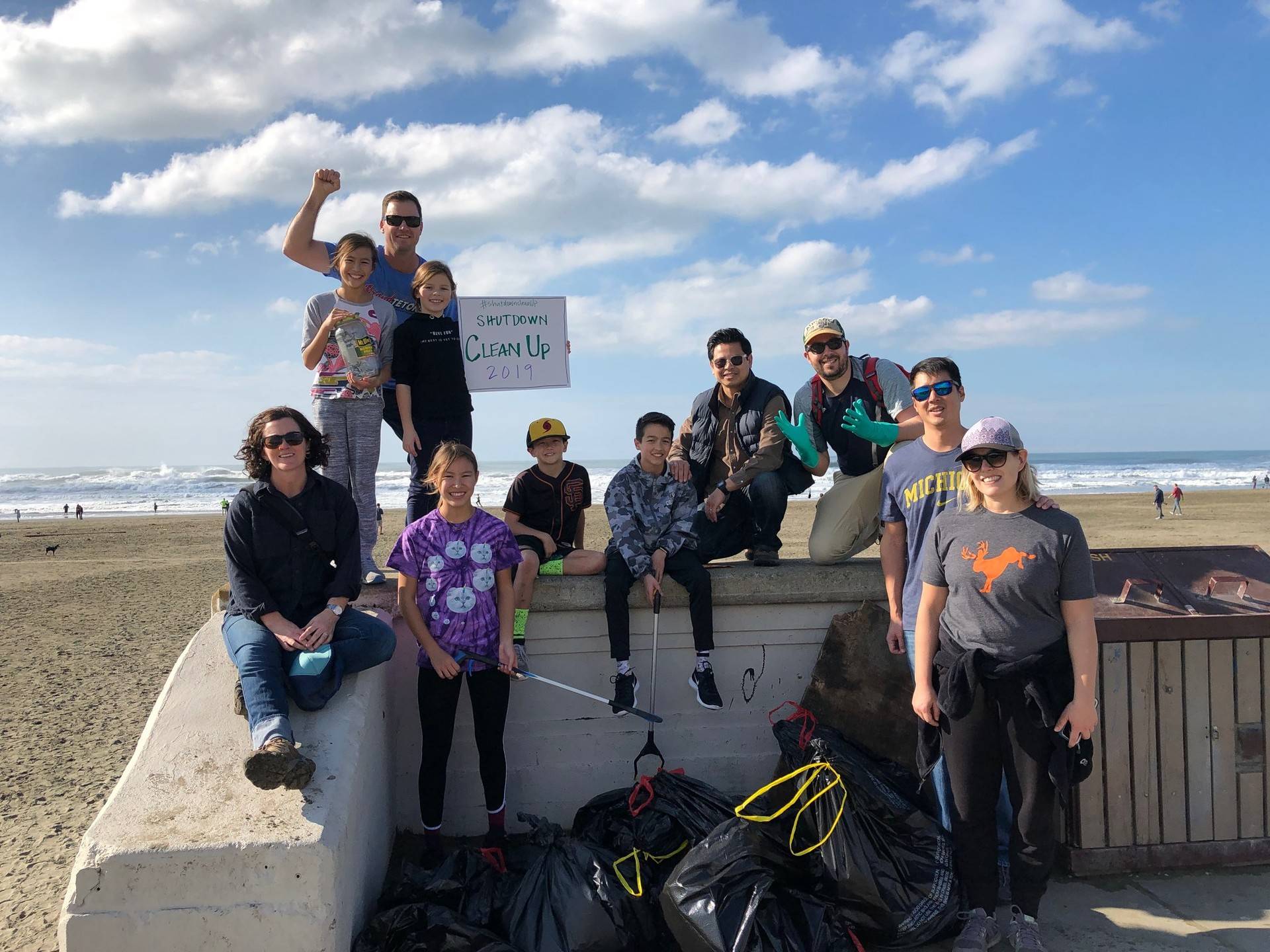 Volunteers picked up trash at Ocean Beach on Jan. 17, 2019, in a cleanup organized by #ShutdownCleanup. Courtesy ShutdownCleanup