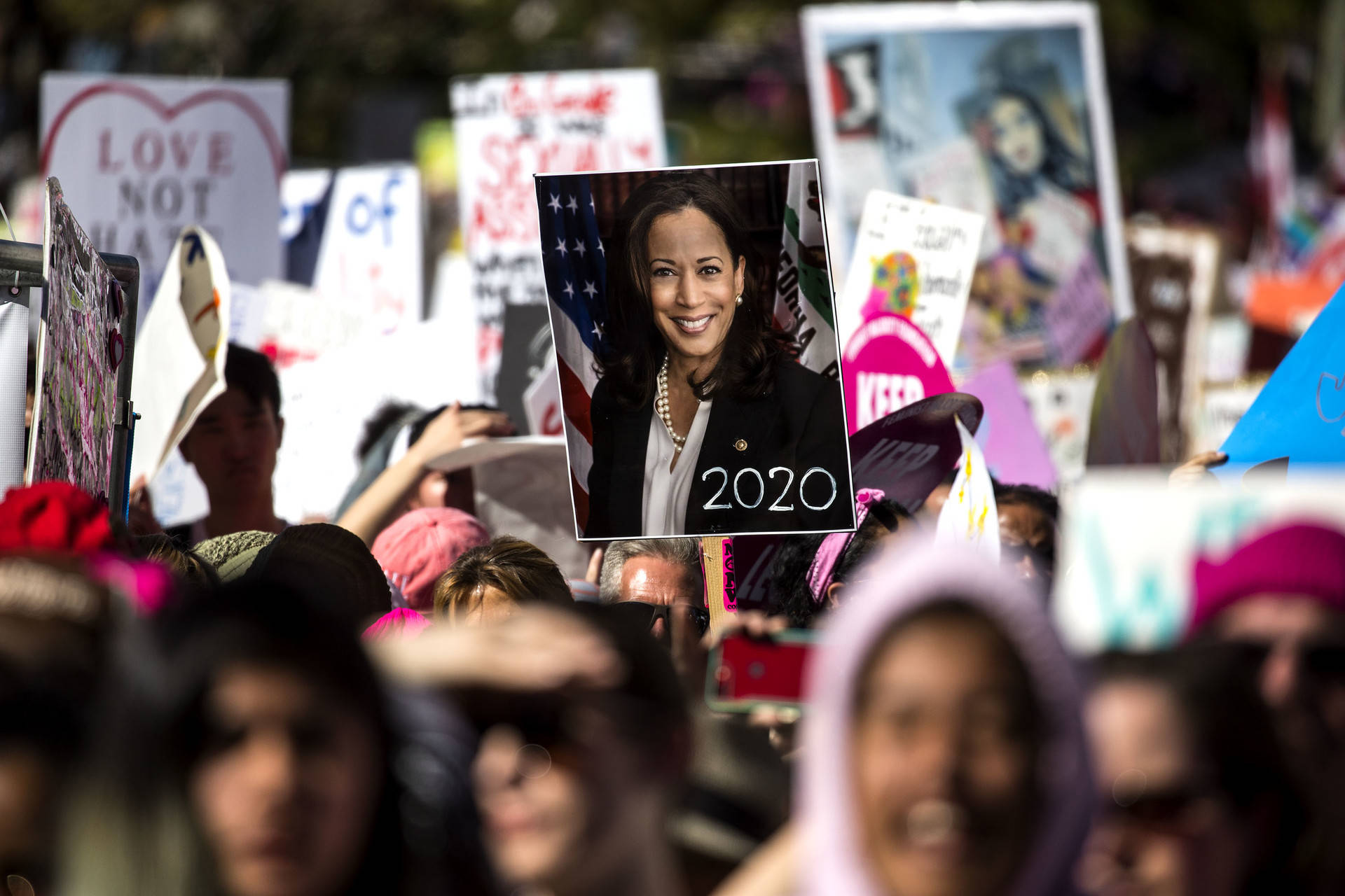 A person holds a poster of California U.S. Sen. Kamala Harris with '2020' written on it at the Women's March in Los Angeles on Jan. 19, 2019. Harris announced her candidacy for president on Monday, January 21, 2019. Barbara Davidson/Getty Images