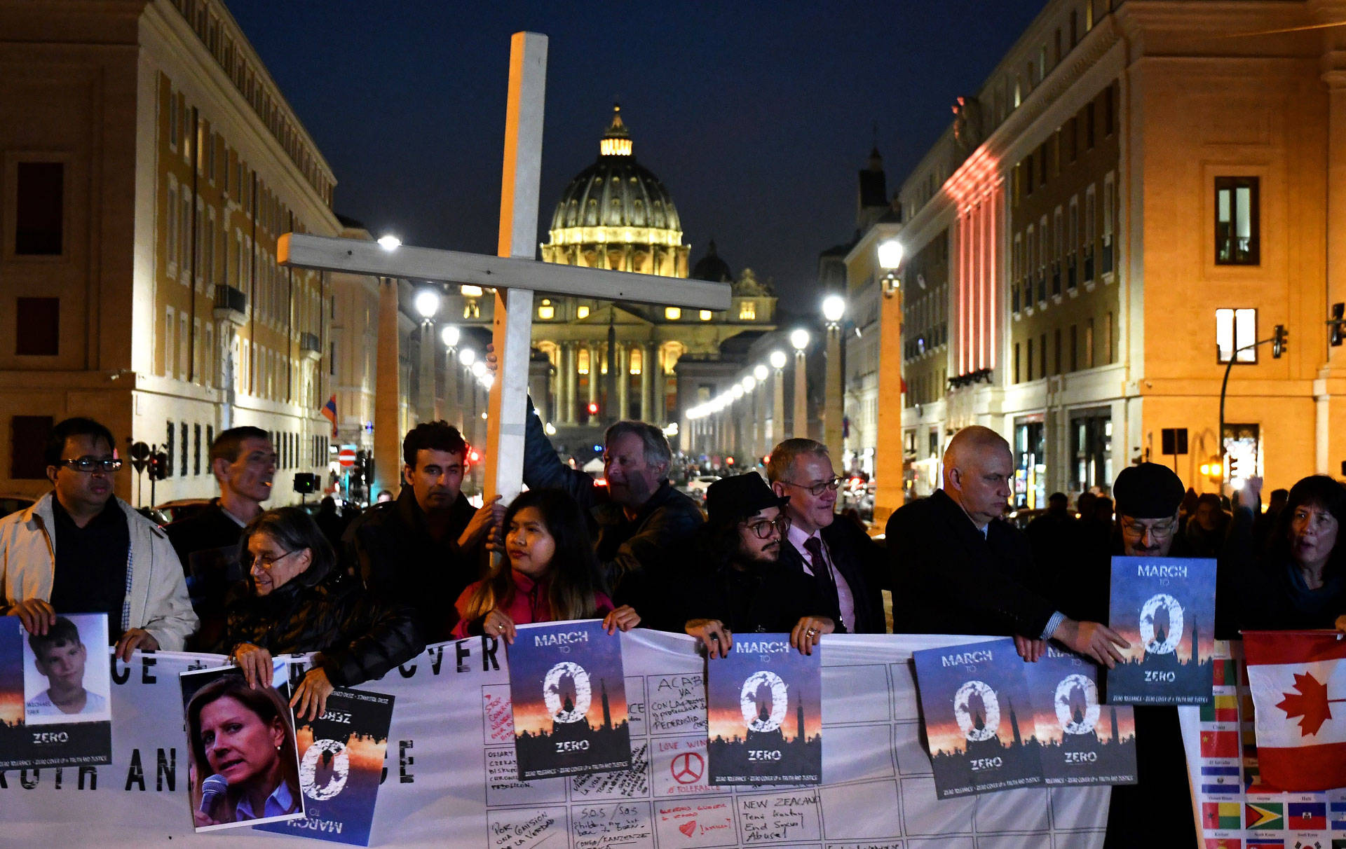 Members of Ending Clergy Abuse (ECA), a global organization of survivors and activists who are in Rome for this week's papal summit on the sex abuse crisis within the Catholic Church, hold a protest gathering on Feb. 21, 2019, in Rome. Their placards read 'Zero Tolerance + Zero Cover Up = Truth and Justice.' ALBERTO PIZZOLI/AFP/Getty Images