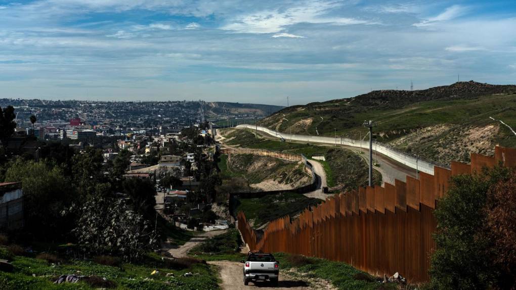 The U.S.-Mexico border fence in Tijuana, Baja California State, Mexico, is seen on Jan. 28. The White House said on Thursday that President Trump plans to sign an emergency declaration to get additional funds for a border wall.
 Guillermo Arias/AFP/Getty Images
