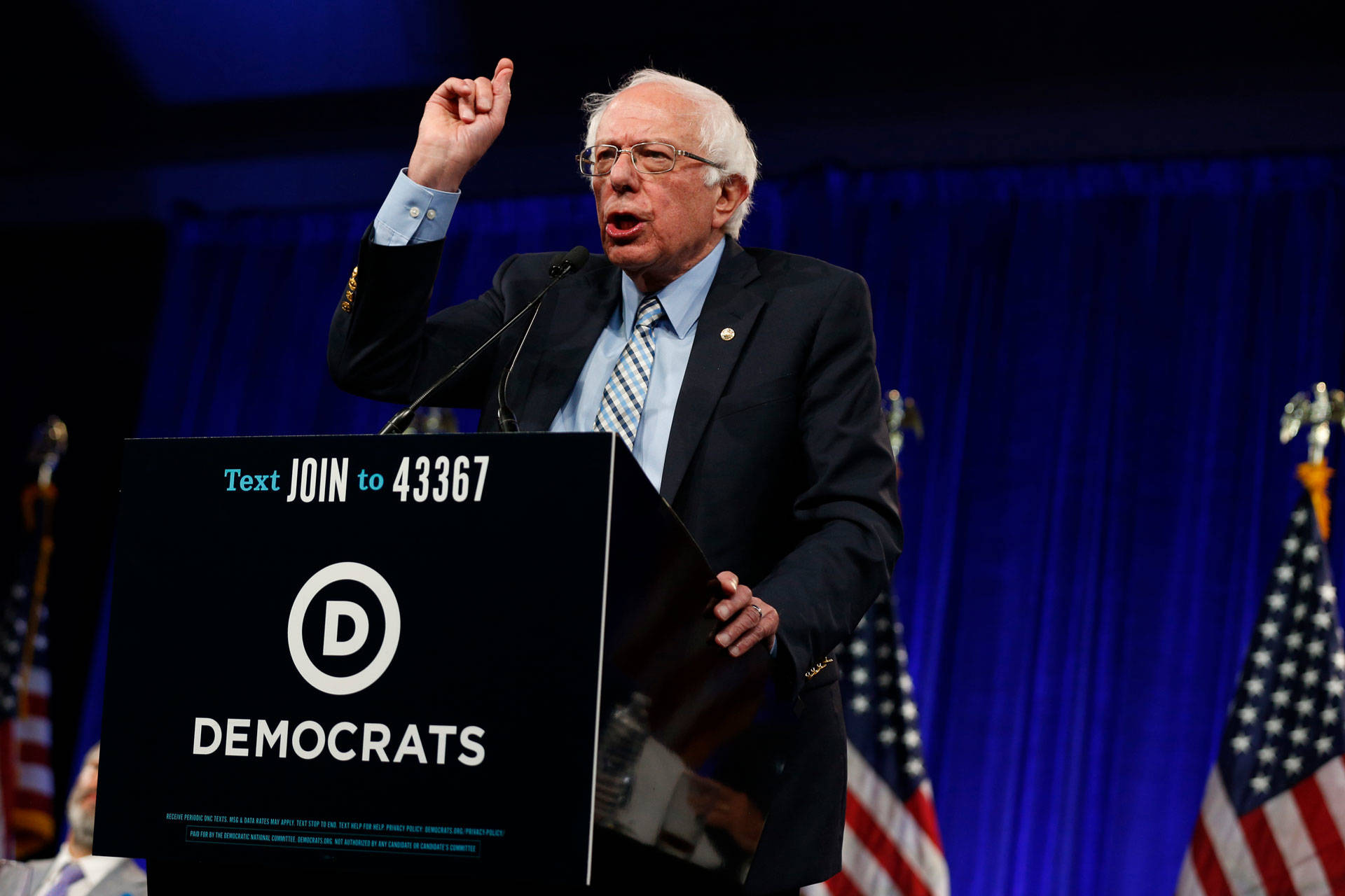 Addressing the DNC's summer meeting in San Francisco on Friday, Vermont Sen. Bernie Sanders stressed the importance of uniting to defeat 'the most dangerous president in American history.' Stephanie Lister/KQED