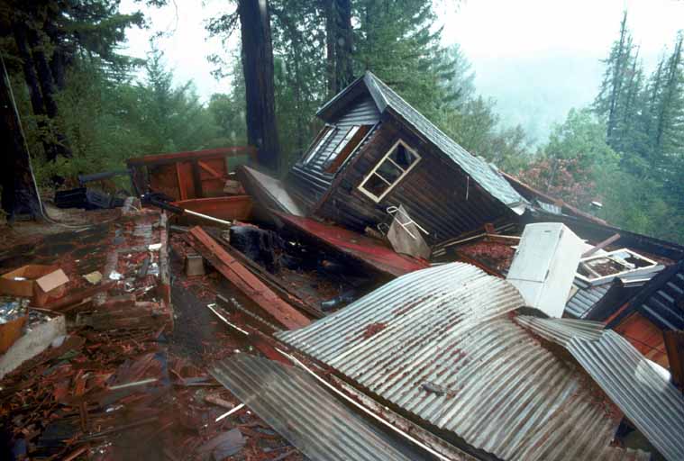 A house in Redwood Grove in the Santa Cruz mountains that was pushed laterally off its cement foundation.