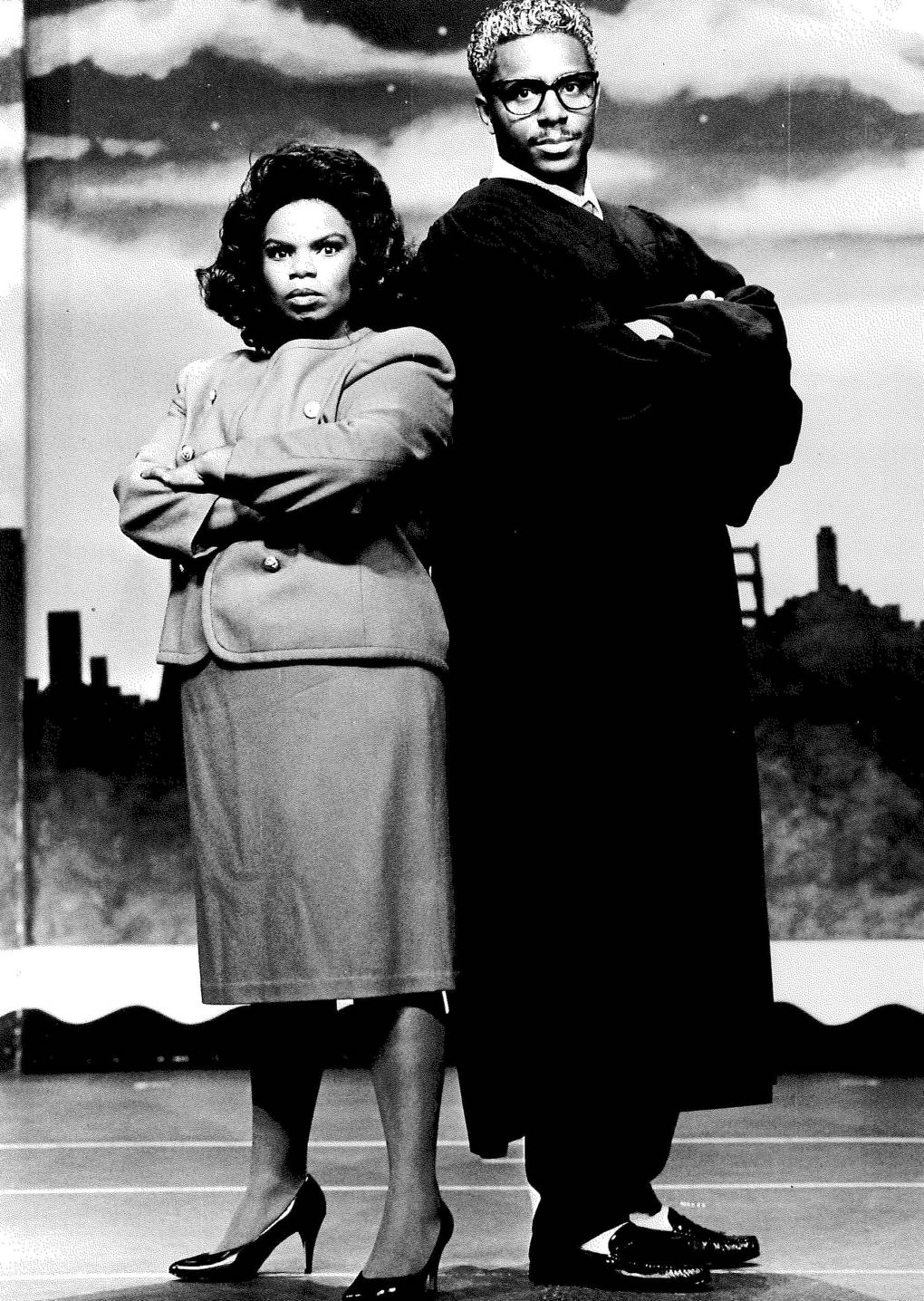 Renee Lubin (left) and Art Hervey (right) as Anita Hill and Clarence Thomas in Beach Blanket Babylon, 1991.