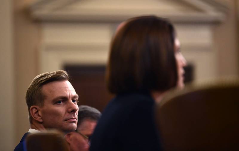 David Holmes, a State Department official stationed at the U.S. Embassy in Ukraine, watches as Fiona Hill testifies during the House Intelligence Committee hearing on Nov. 21, 2019.