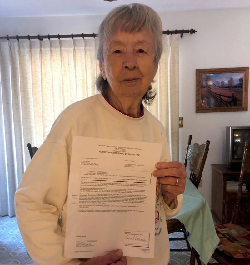 Emma Titus holds a letter of nonrenewal from her insurer, The Hartford. Her homeowners policy expired Nov. 14, 2019.